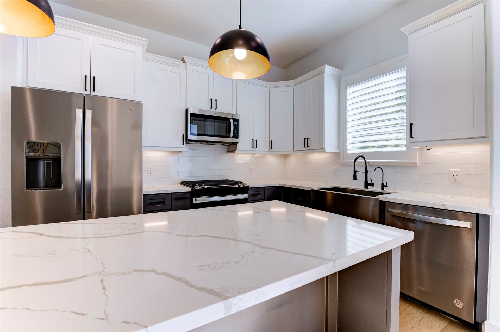 10910 Fire Creek Drive, Houston, TX 77043 Open Kitchen with stainless steel appliances.