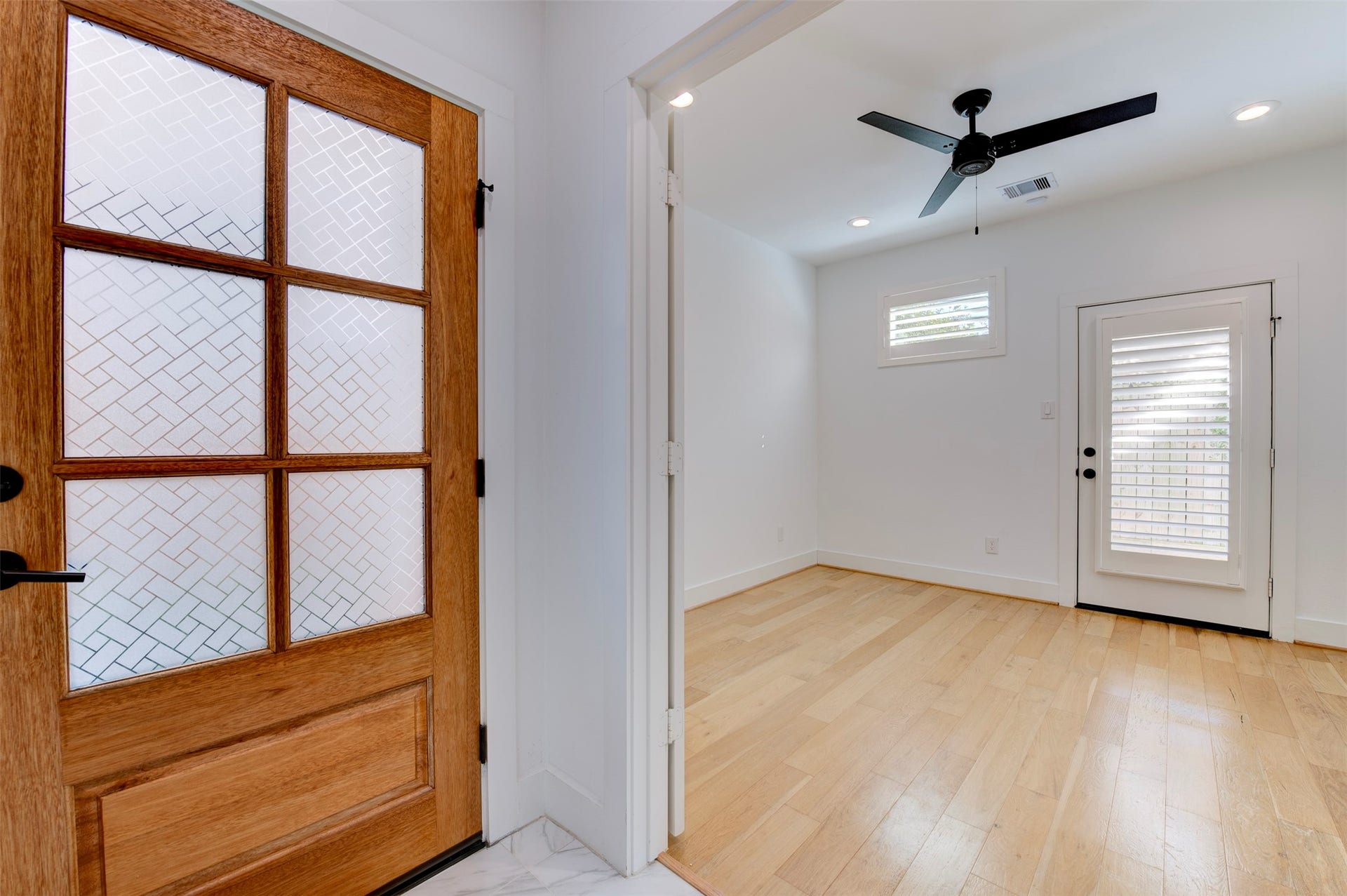 10910 Fire Creek Drive, Houston, TX 77043 Front door leading to the first bedroom/office with full bathroom.