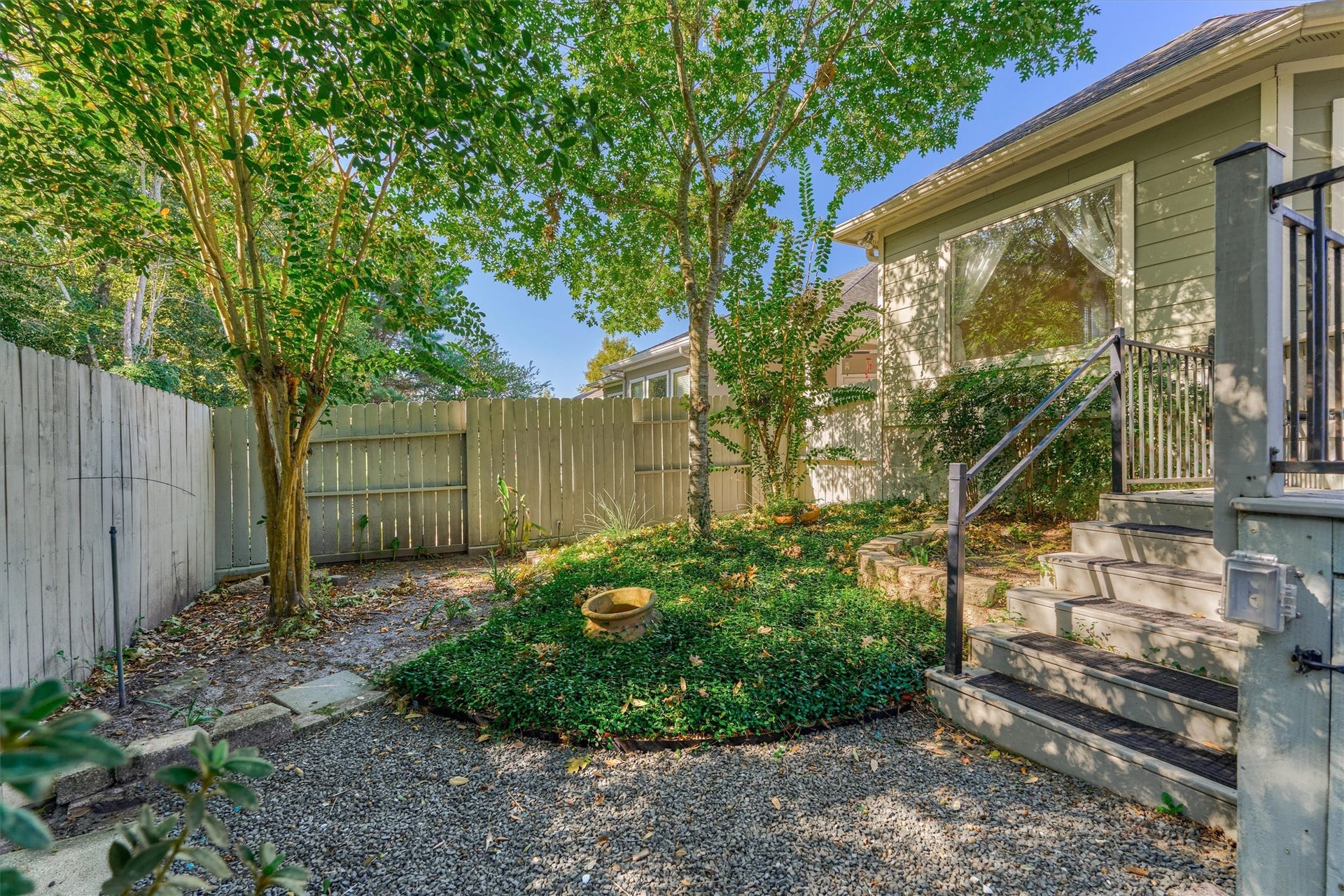 1794 Canyon Lake Creek Drive, Conroe, TX 77304 Mature landscaping surround the property.