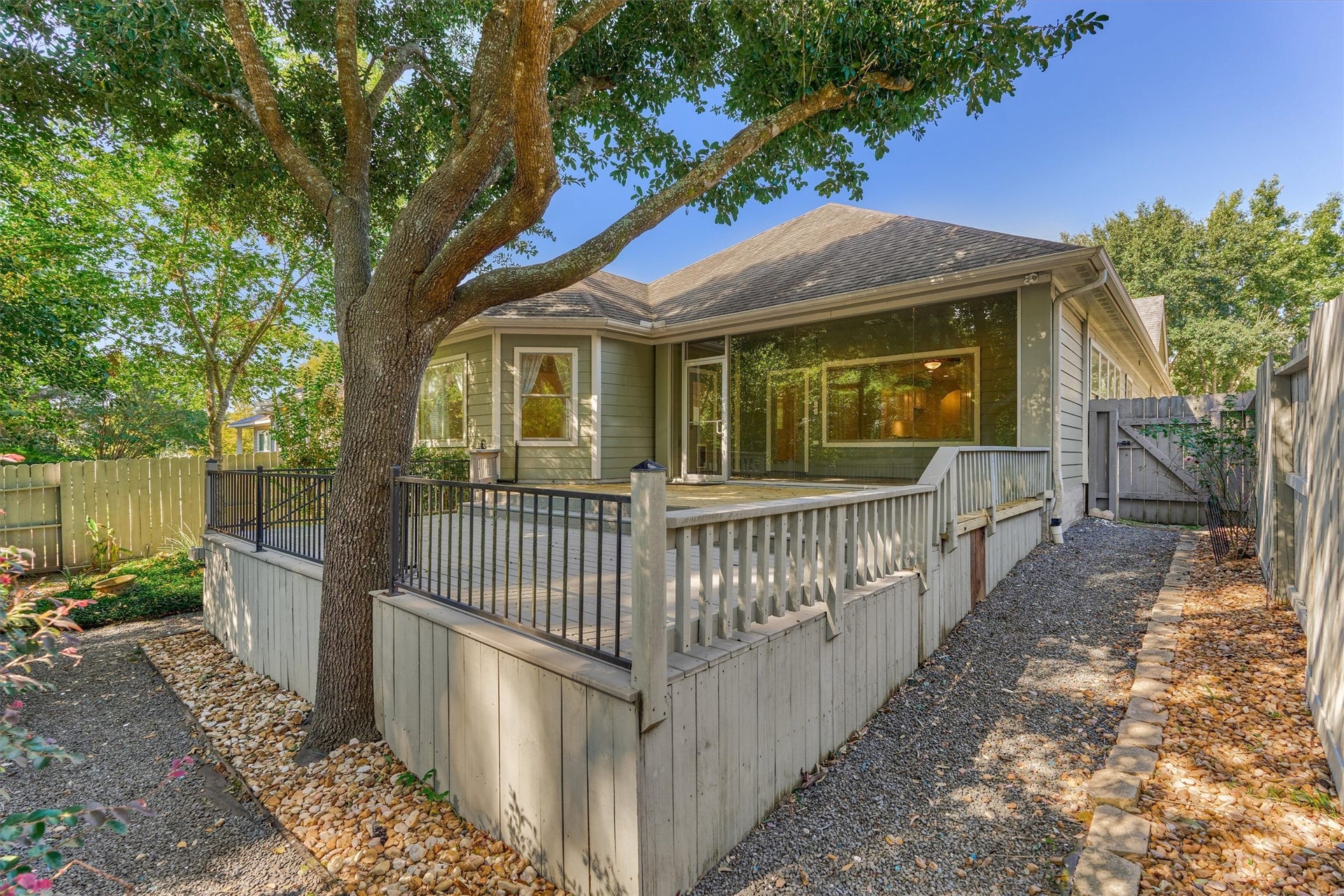 1794 Canyon Lake Creek Drive, Conroe, TX 77304 A mature tree provides plenty of shade on the deck.
