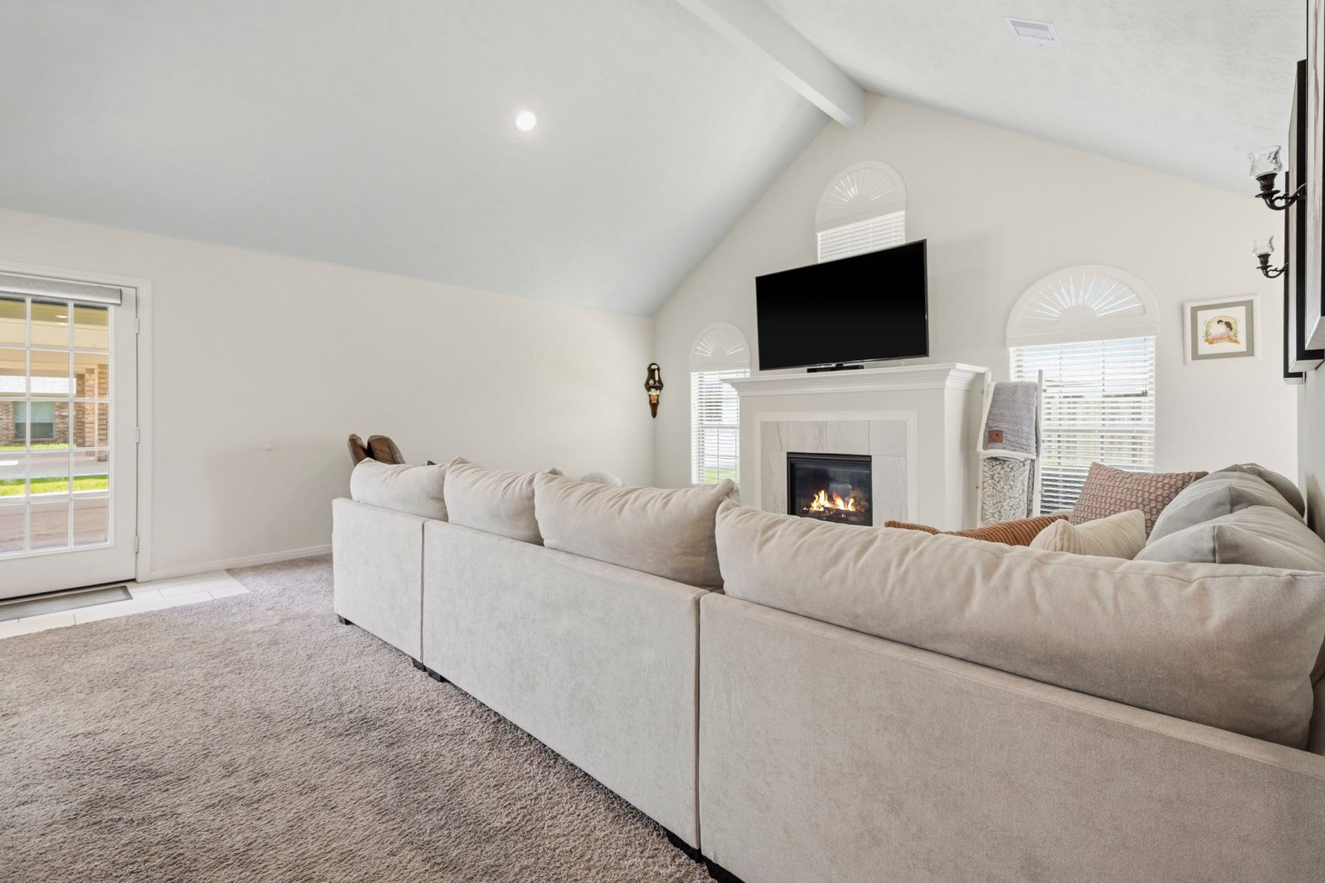 2102 Wikiup Street, Dickinson, TX 77539 Vaulted ceilings in living area with an abundance of natural light.