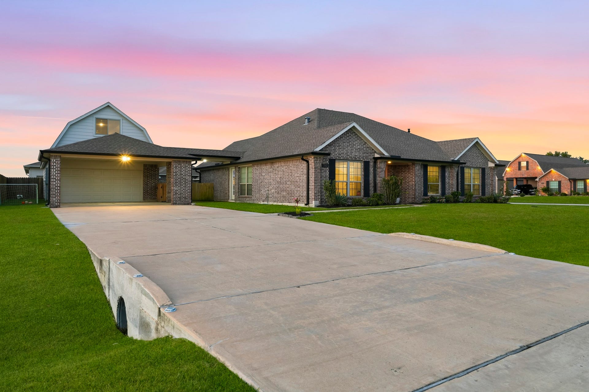 2102 Wikiup Street, Dickinson, TX 77539 Driveway view of home.