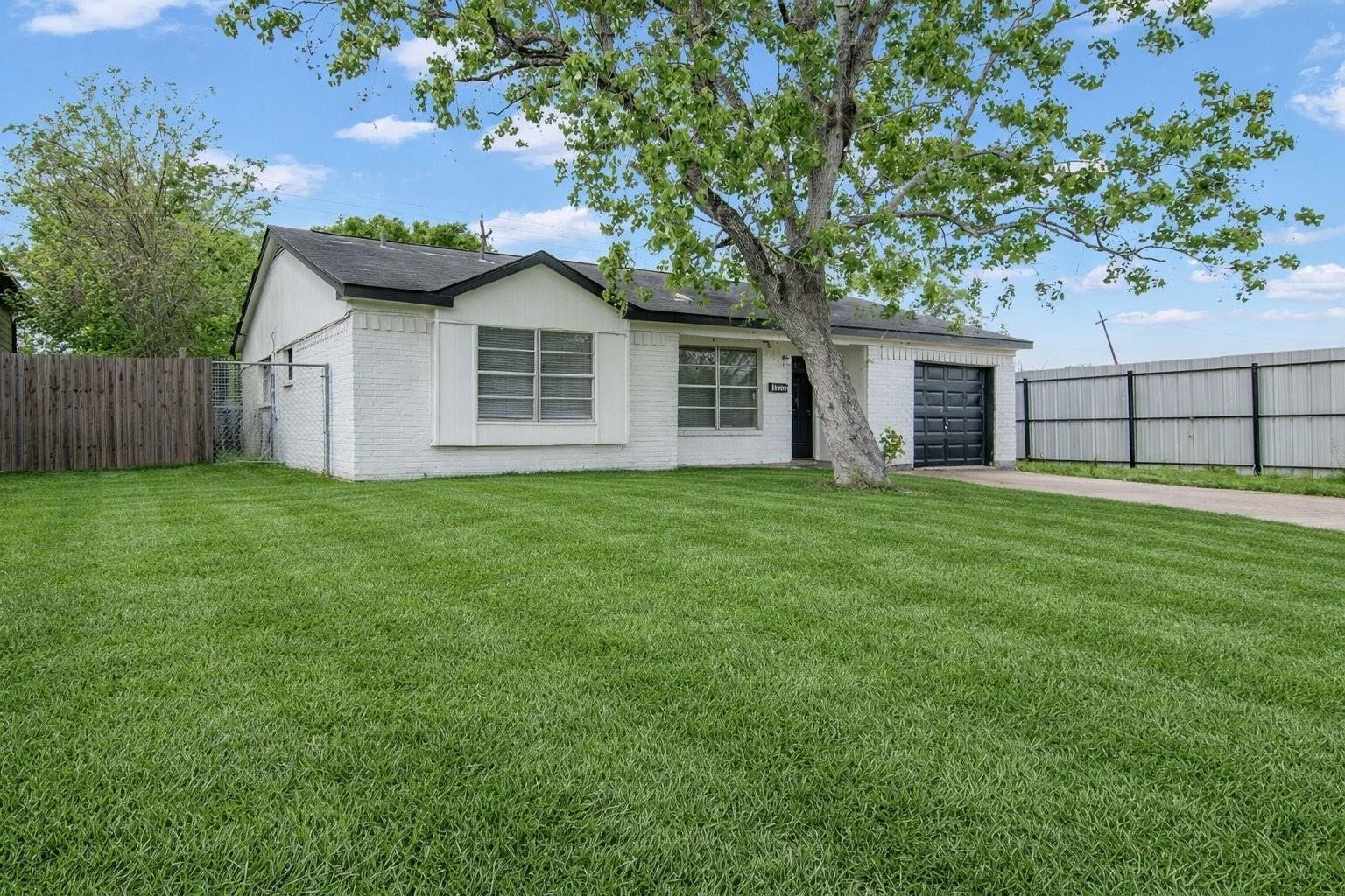 10902 Jutland Road, Houston, TX 77048 The single-car garage offers convenient, secure parking and features a newly installed automatic garage door opener. Utility hookups provide added functionality, including a dedicated electric dryer connection.
