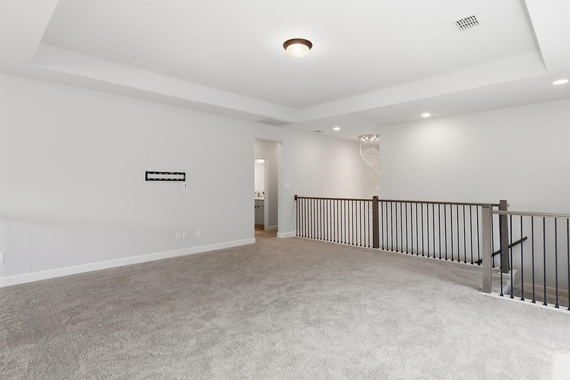 30135 Gold Finch Place, Fulshear, TX 77441 Designed with versatility in mind, this spacious upstairs retreat offers ample room for movie nights, game tables, a home office, or a secondary family room. The open layout adapts effortlessly to your lifestyle.