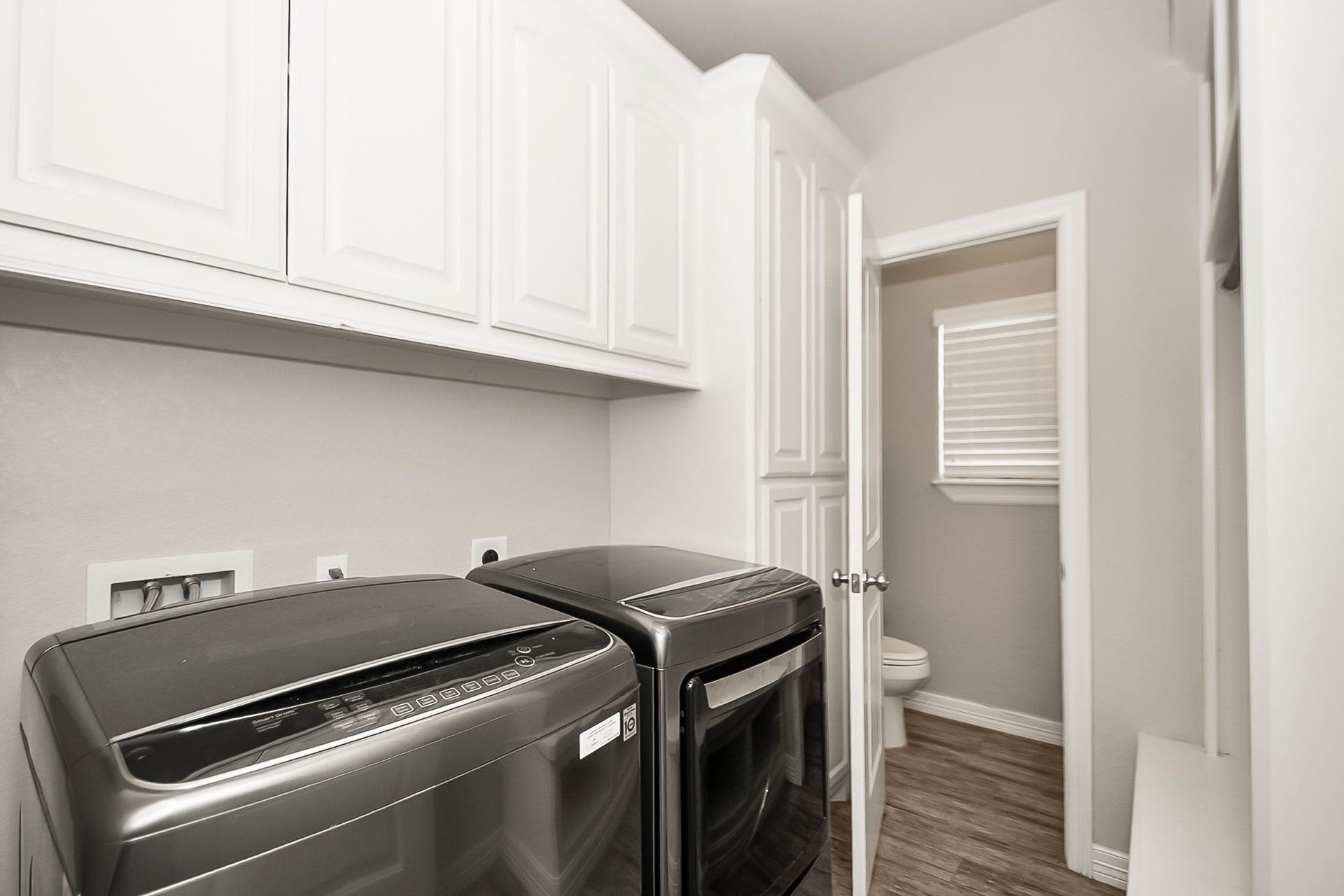 Indoor Laundry Room with additional storage
