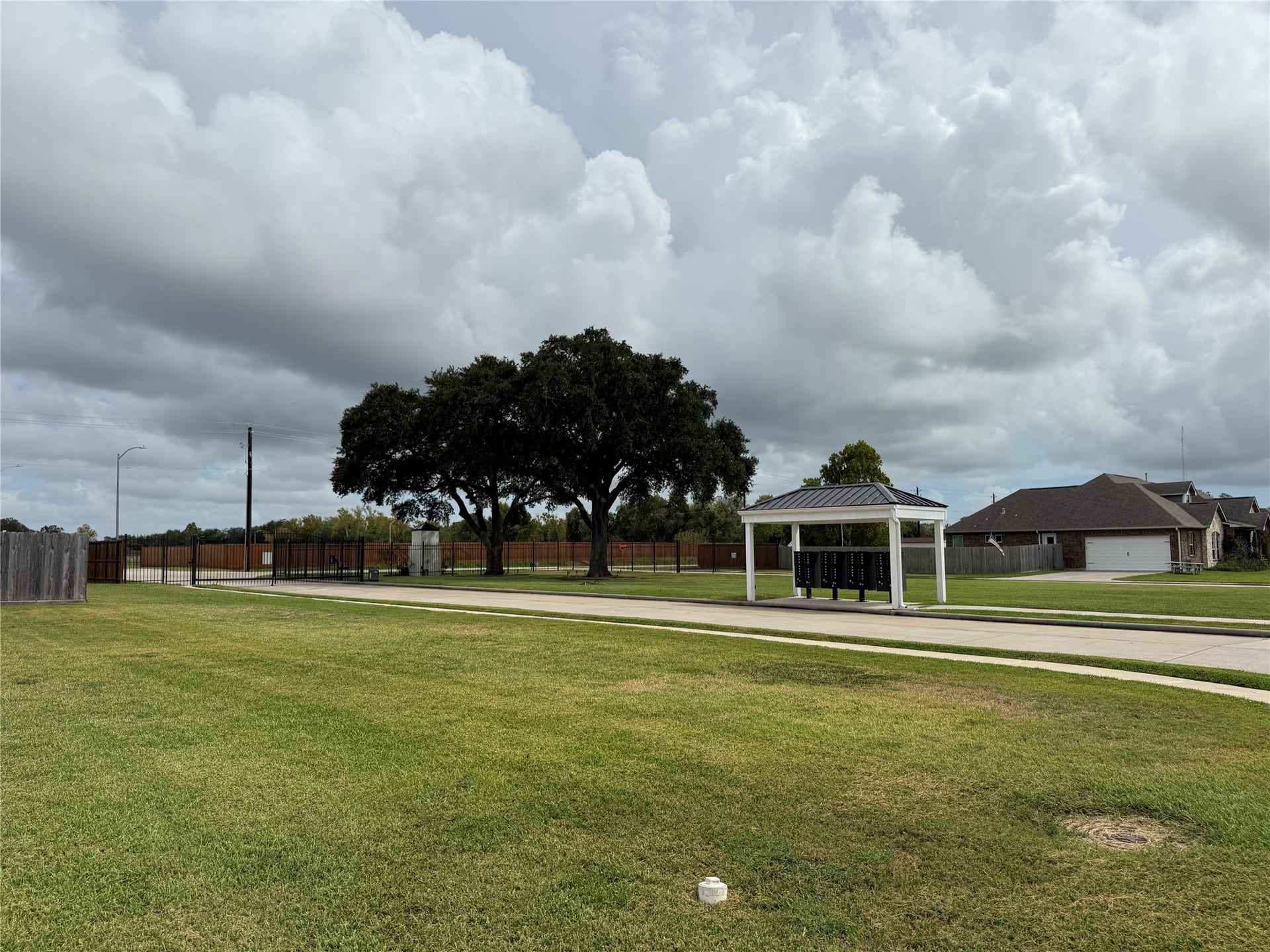 3117 E TOWER Circle, Santa Fe, TX 77517 Community gate and mailboxes, located to the right of the lots when facing them from E Tower Cir.