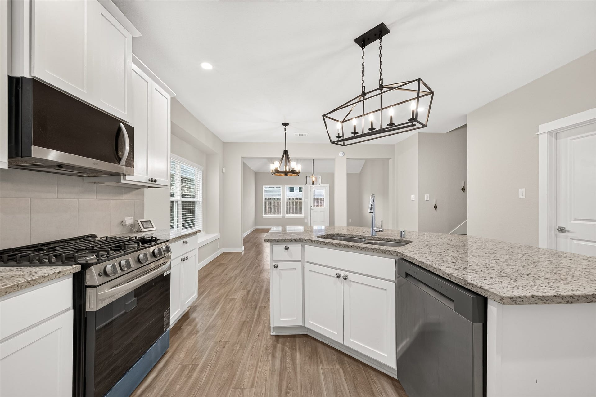 32922 Ruthie Dean Drive, Fulshear, TX 77423 Gas cooking, ample counter space, and a practical kitchen layout make meal preparation convenient.