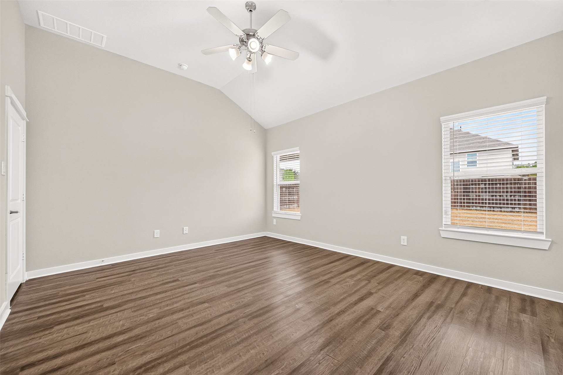 32922 Ruthie Dean Drive, Fulshear, TX 77423 Another view of the primary suite highlights its natural light, neutral palette, and space for your furniture arrangement.