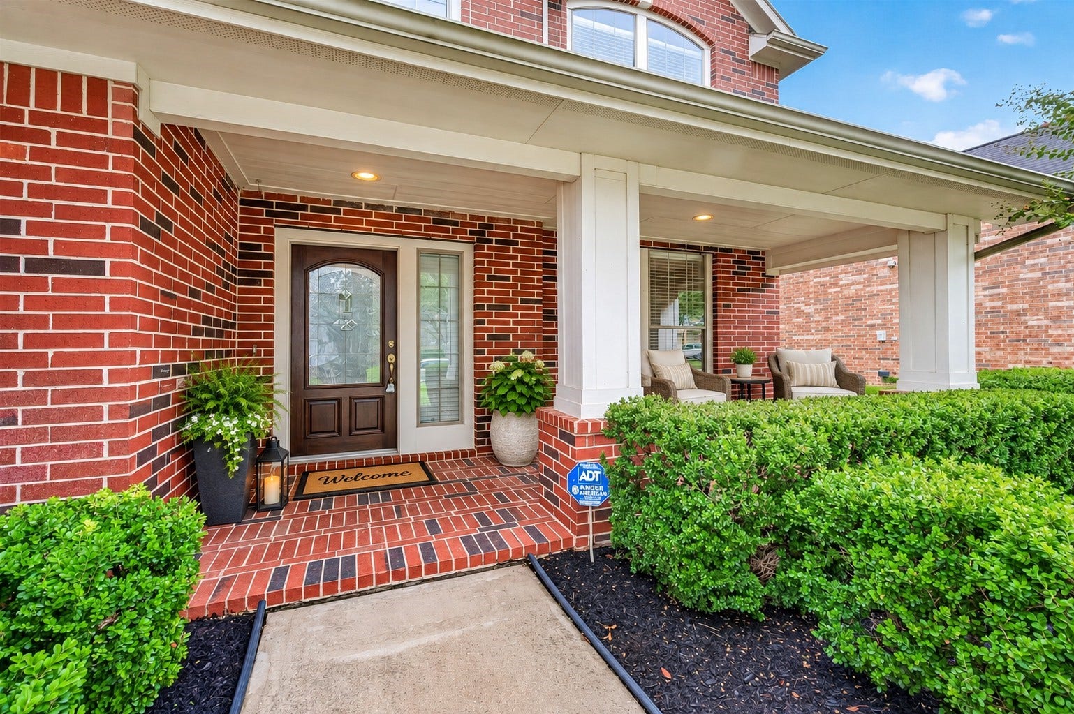 21834 Canton Pass Lane, Katy, TX 77450 A charming covered brick front porch creates a warm, welcoming entrance with plenty of space to relax and enjoy. The brick detailing and sheltered entry add timeless character and inviting curb appeal. **Virtually Staged**