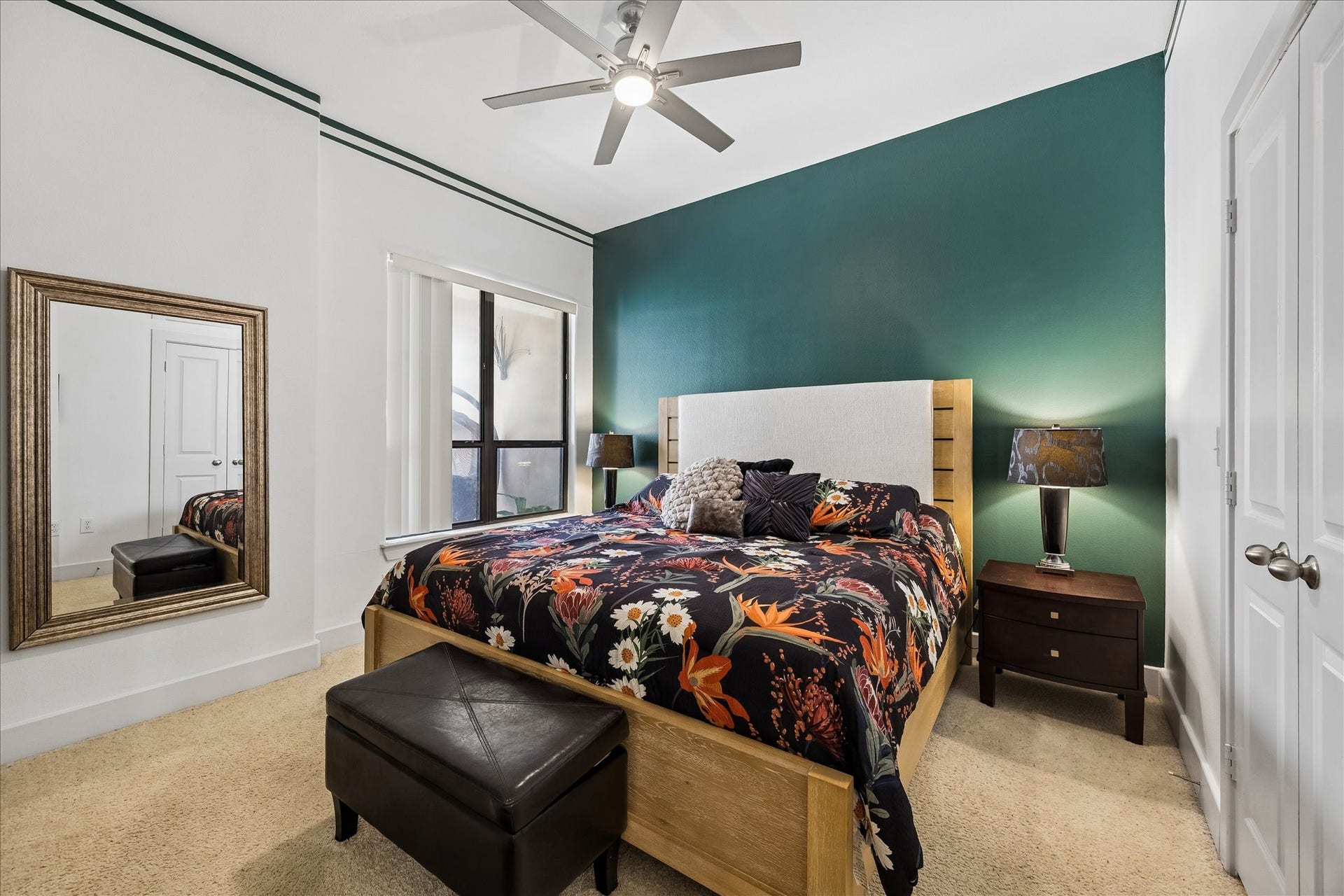 1901 Post Oak Boulevard, #3216, Houston, TX 77056 Primary bedroom with high ceilings, accent wall, and large walk-in closet.