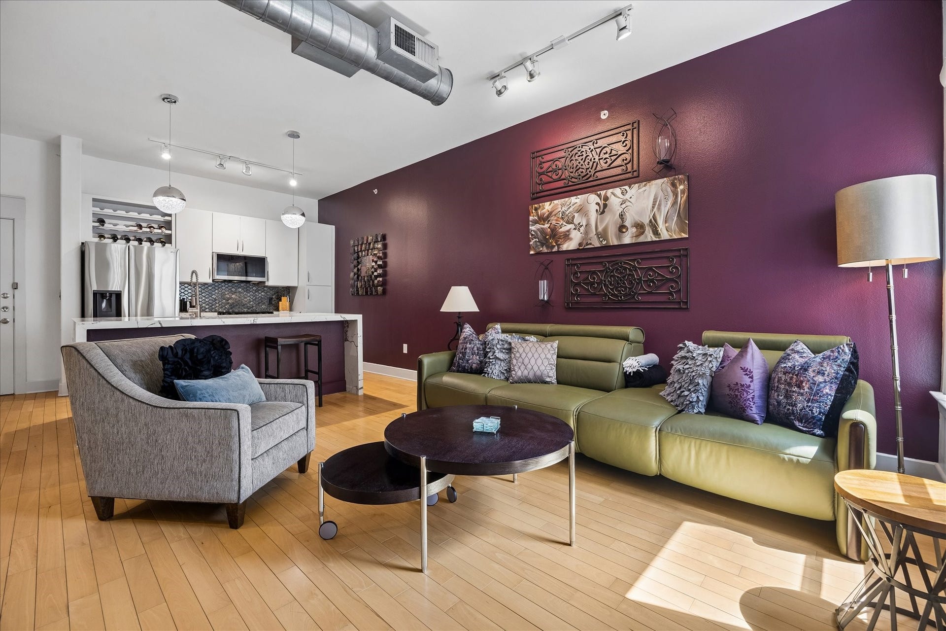 1901 Post Oak Boulevard, #3216, Houston, TX 77056 Renovated interior with hardwood floors, high ceilings and exposed ductwork.
