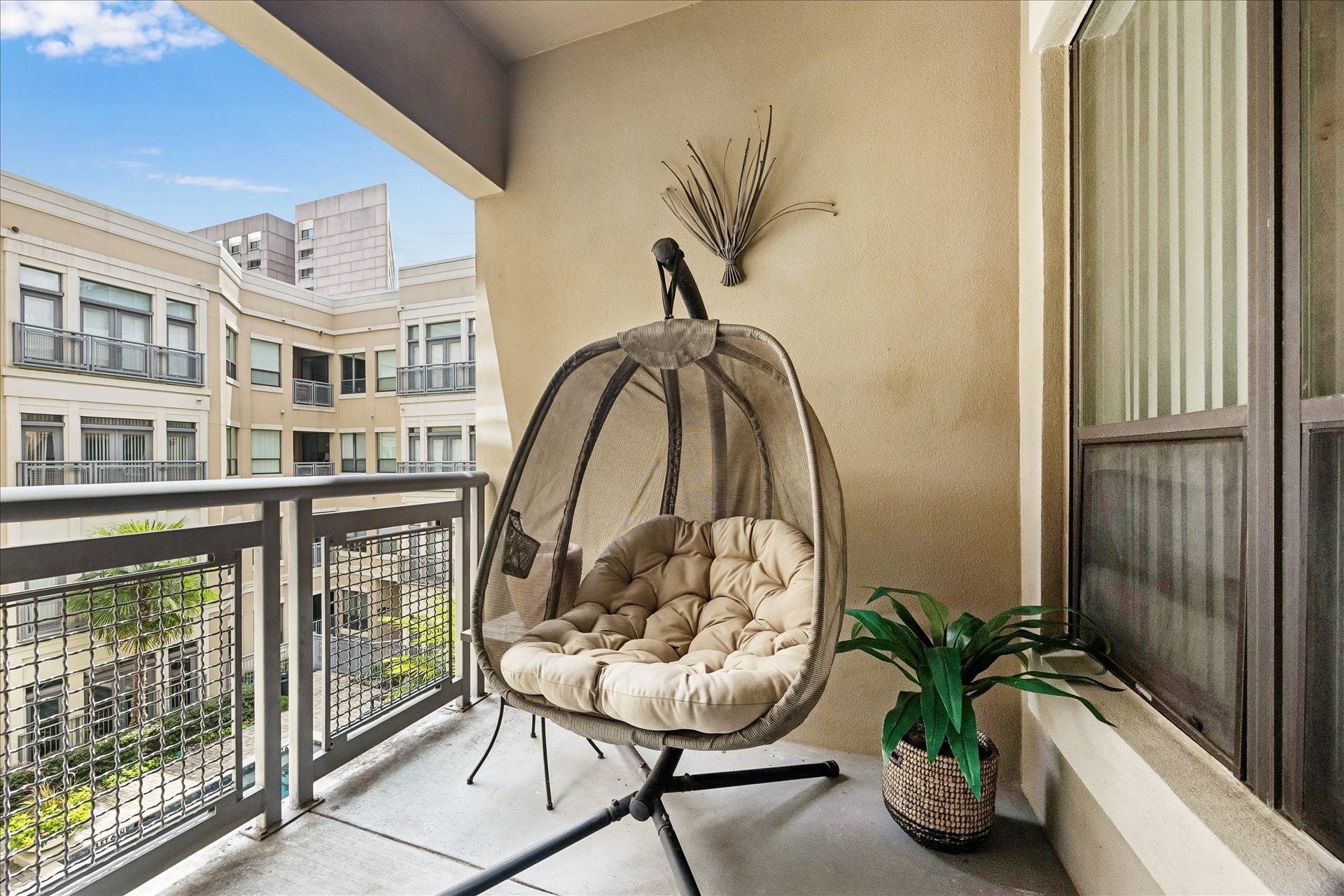 1901 Post Oak Boulevard, #3216, Houston, TX 77056 Covered private balcony overlooking the pool courtyard.