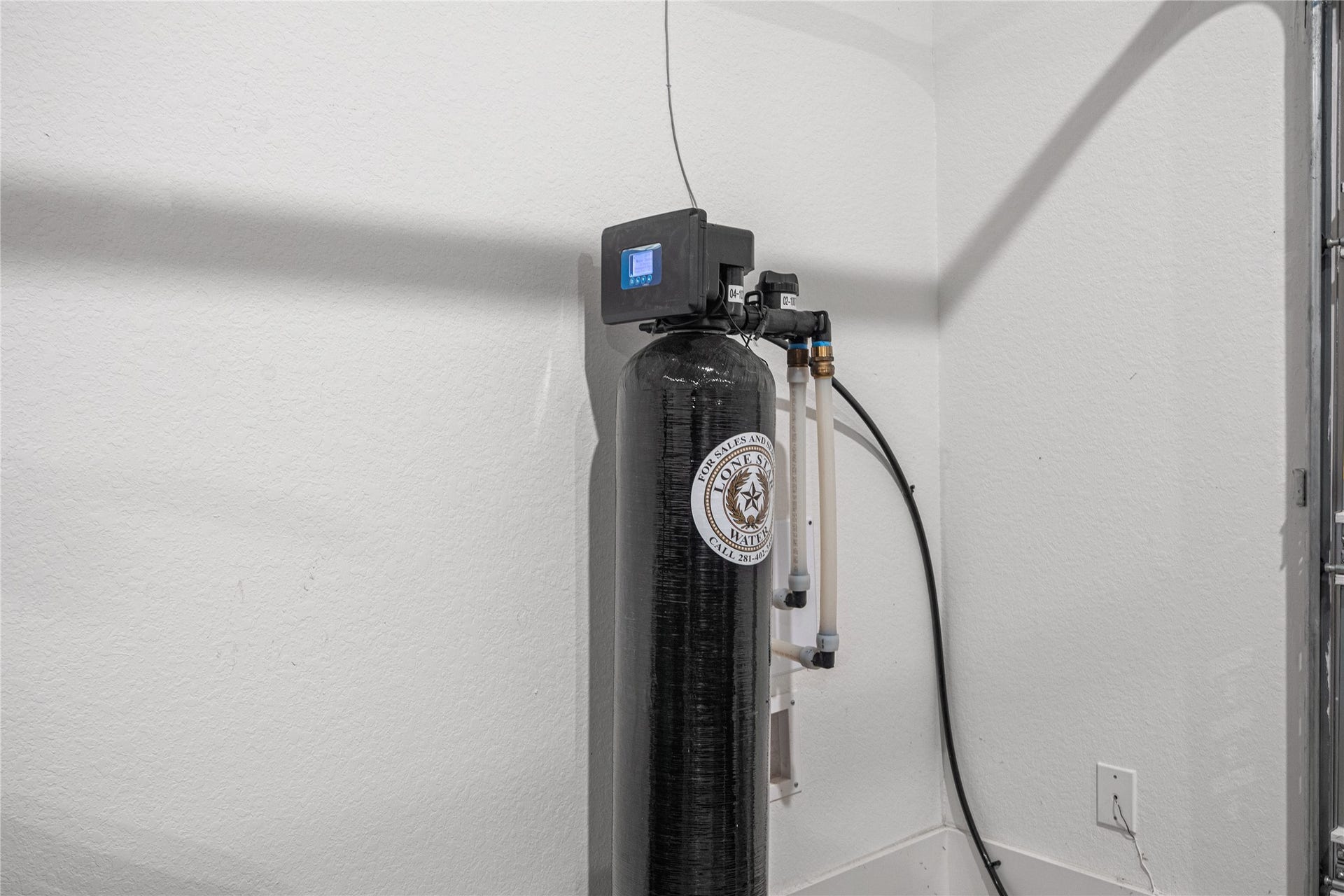 4114 Pleasant Ridge Drive, Spring, TX 77386 Whole home water softener includes virus and bacteria filters.