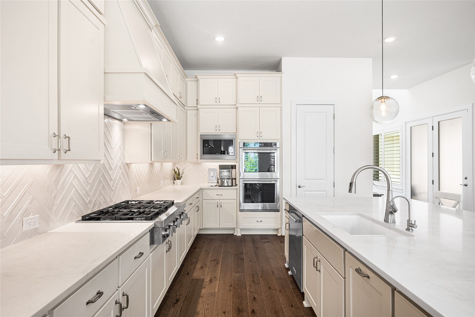 4114 Pleasant Ridge Drive, Spring, TX 77386 Generous cabinetry extends all the way to the ceiling, maximizing storage while enhancing both functionality and a polished, streamlined look.