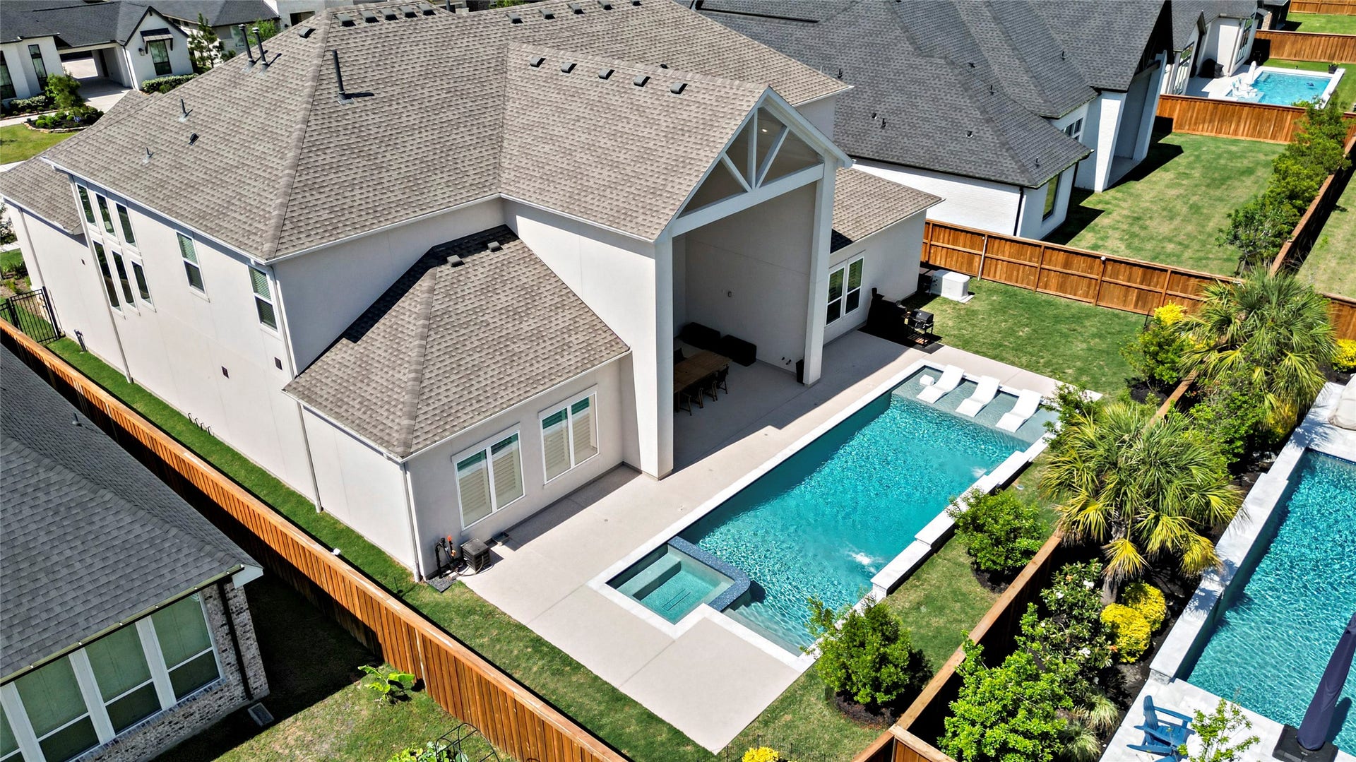 4114 Pleasant Ridge Drive, Spring, TX 77386 Aerial view of the pool and backyard.