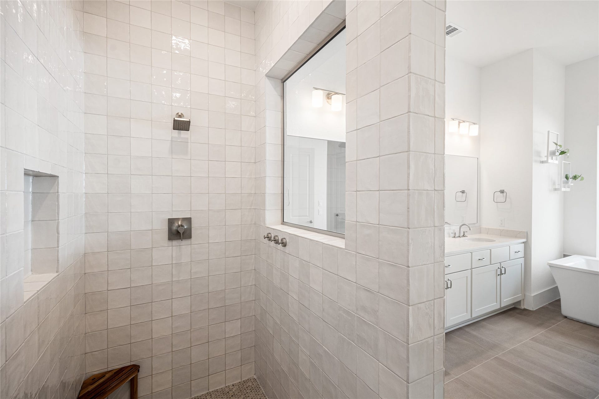 4114 Pleasant Ridge Drive, Spring, TX 77386 Upgraded oversized shower featuring stunning tile work, creating a spa-like retreat with both style and comfort.