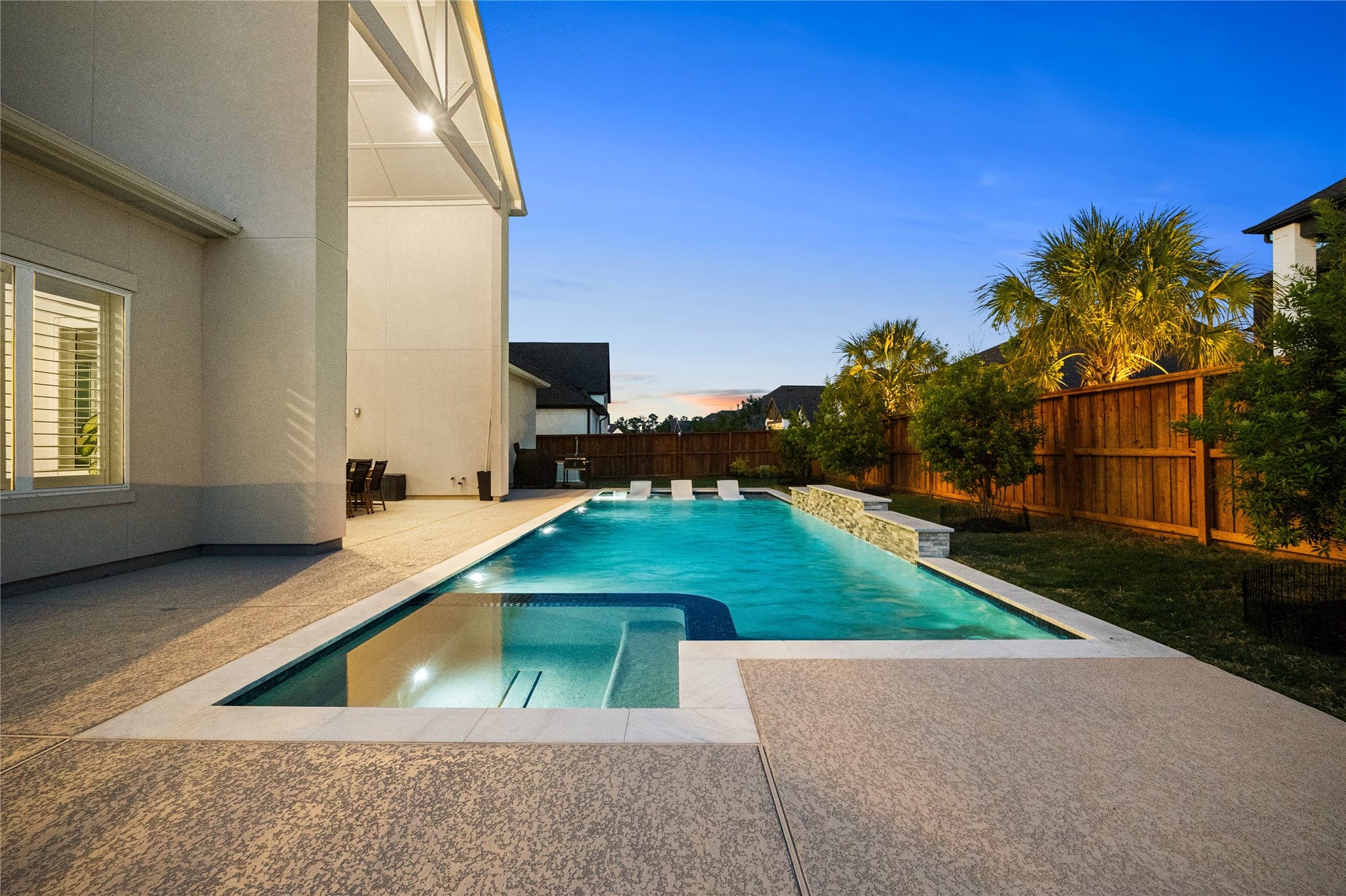 4114 Pleasant Ridge Drive, Spring, TX 77386 Fully heated pool with a spa chiller ensures year-round enjoyment, so you can relax and entertain in every season.
