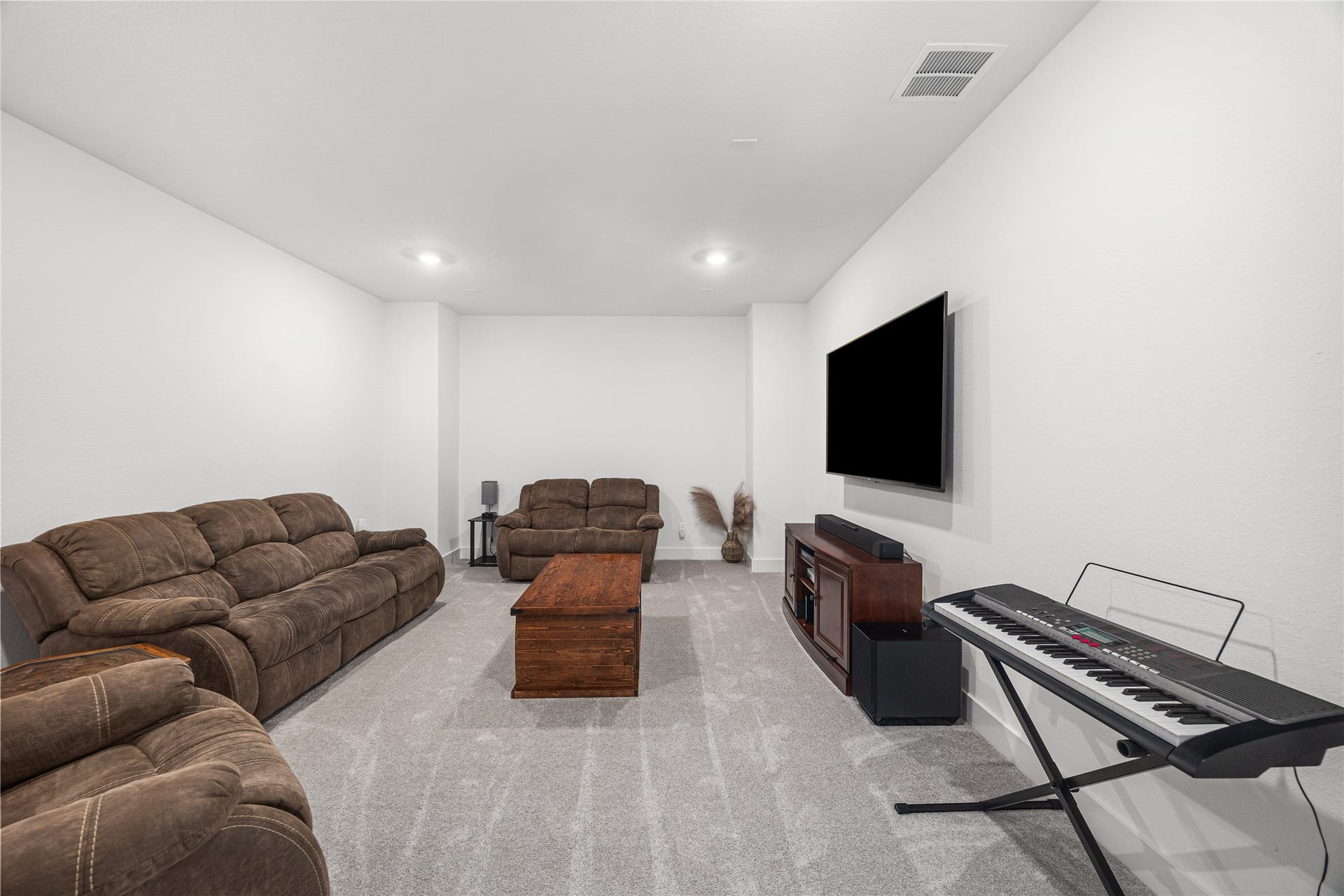 4114 Pleasant Ridge Drive, Spring, TX 77386 Versatile media room designed to adapt to your familys lifestyleperfect for movie nights, gaming, or creating your own private retreat.