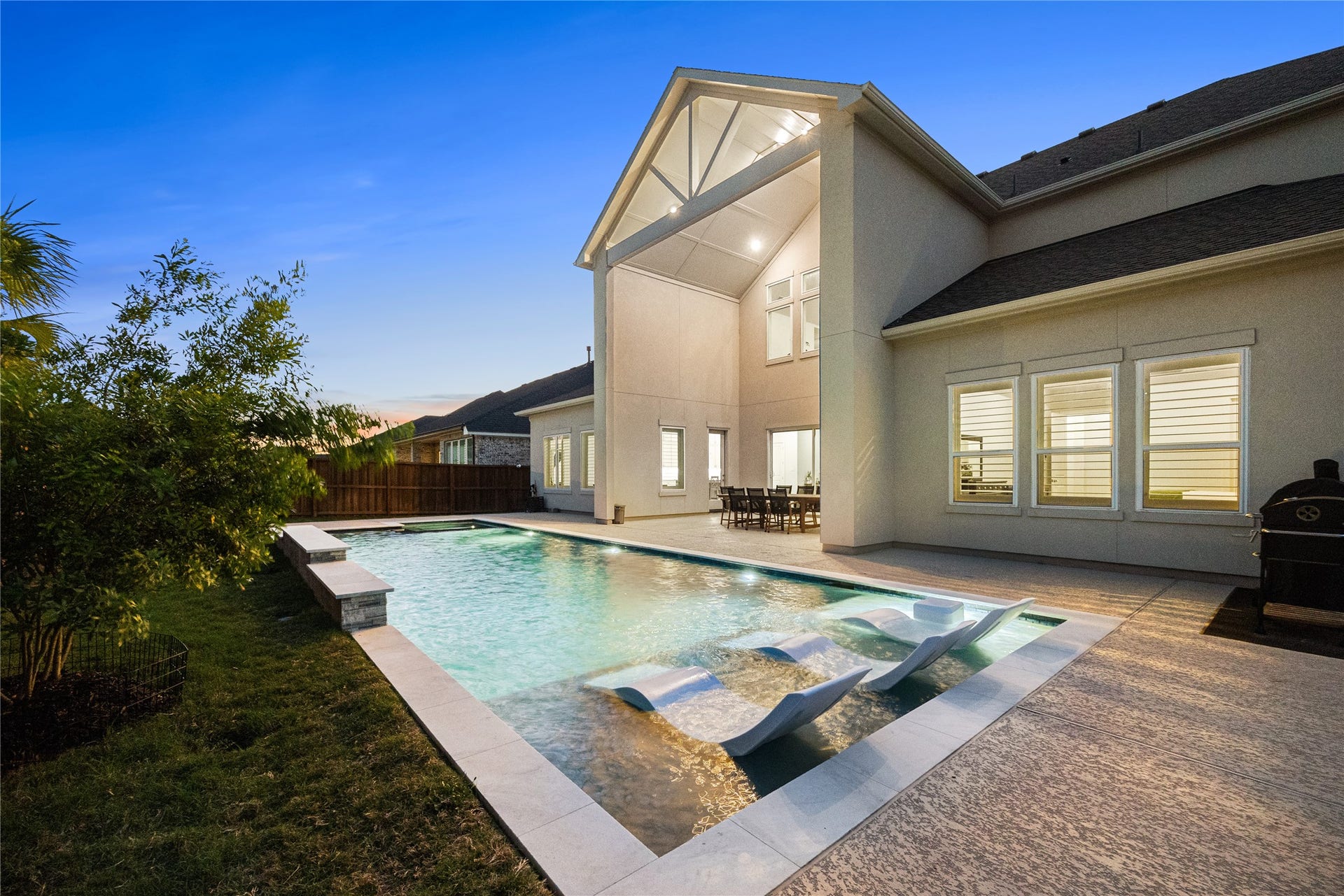 4114 Pleasant Ridge Drive, Spring, TX 77386 Sports pool with tanning ledge and spa.
