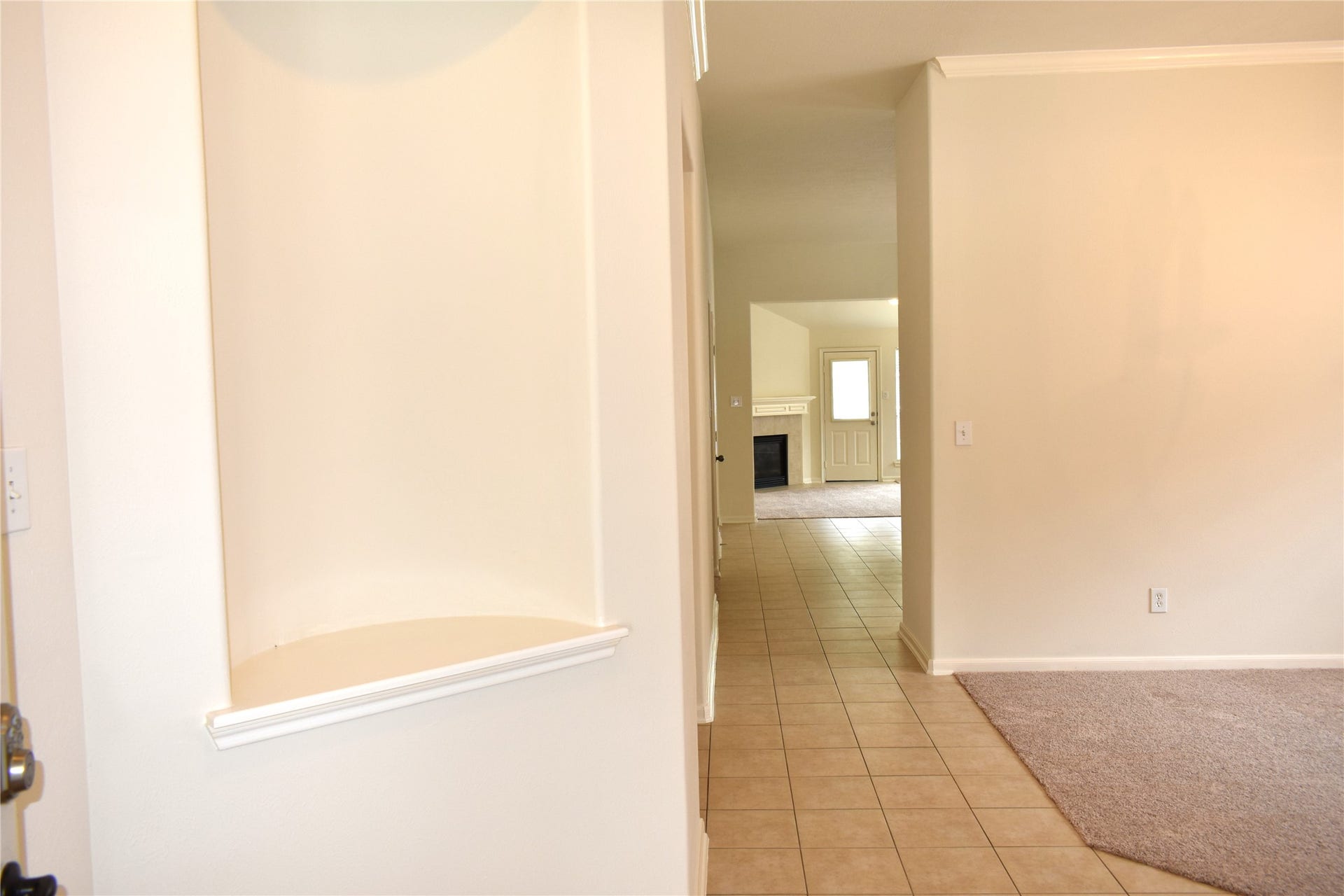 4822 Harbor Glen Lane, Houston, TX 77084 Entering the Front Door, there is an attractive niche on the left, study / office on right, followed by the formal dining room