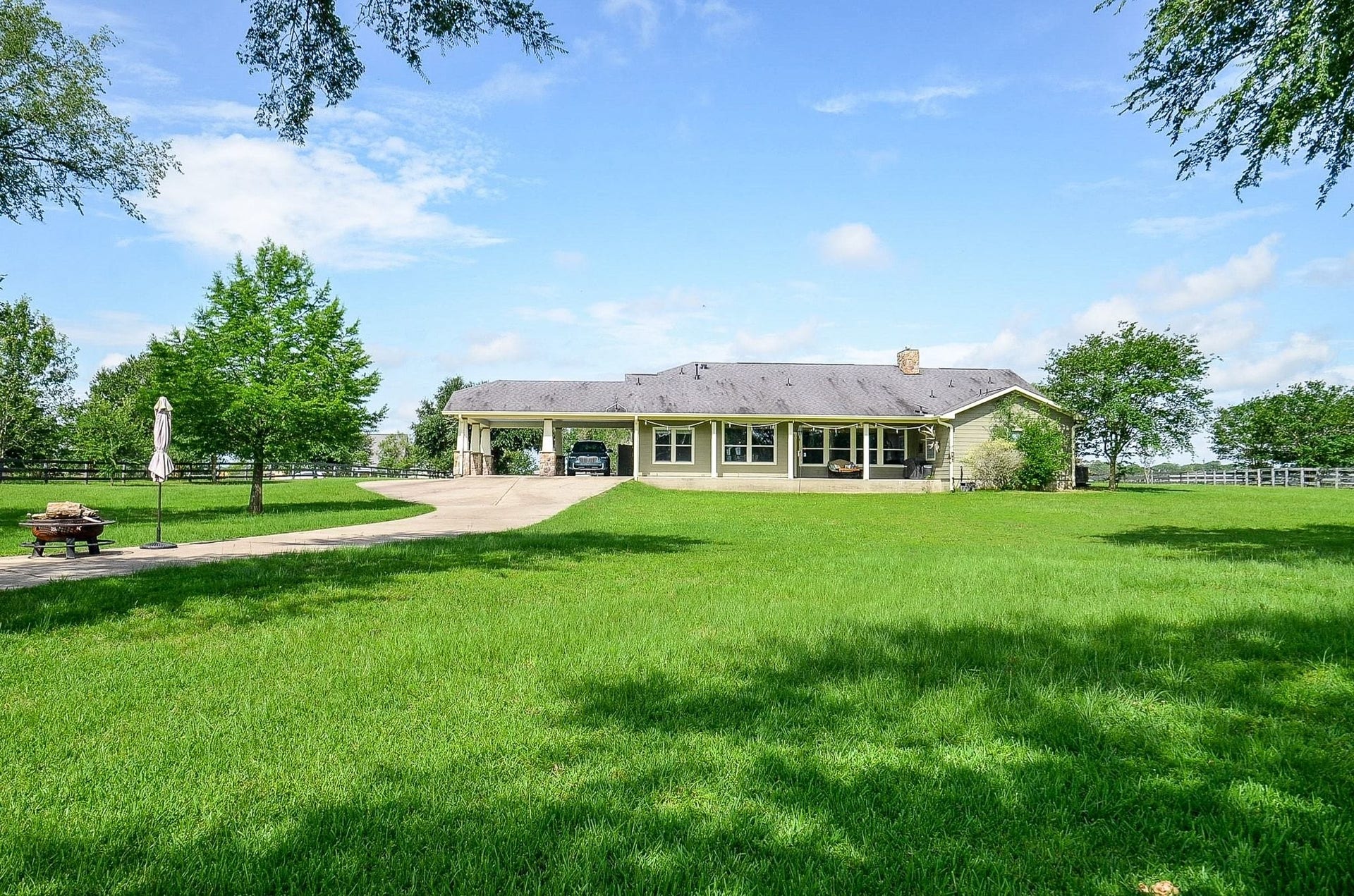 27644 Spring Hill Road, Hempstead, TX 77445 What a marvelous, open view of the path to and from the home and garages!