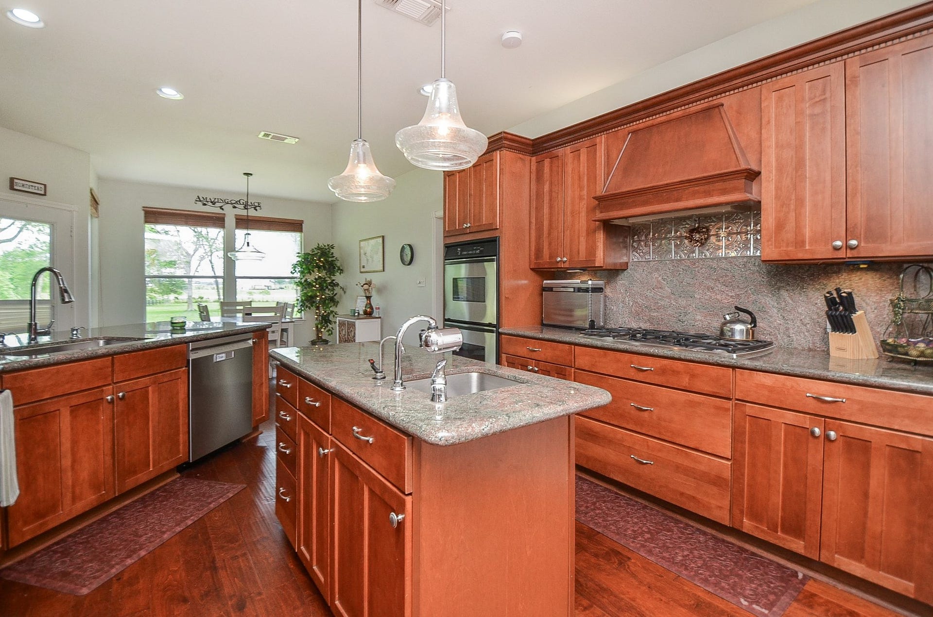 27644 Spring Hill Road, Hempstead, TX 77445 This spectacular chef's kitchen is a dream come true for the family cook! Gorgeous, warm, cedar colored cabinetry fills the space, up and down, with wide paths to allow easy tasking.