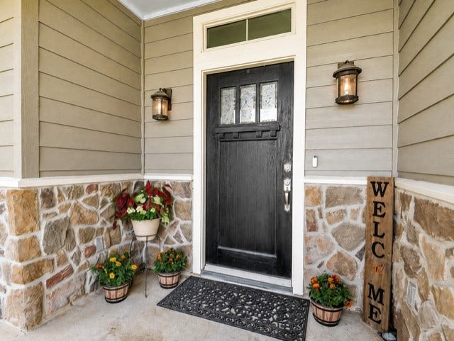 27644 Spring Hill Road, Hempstead, TX 77445 Step into a warm and inviting entrance, enhanced by charming stone accents and welcoming decor.