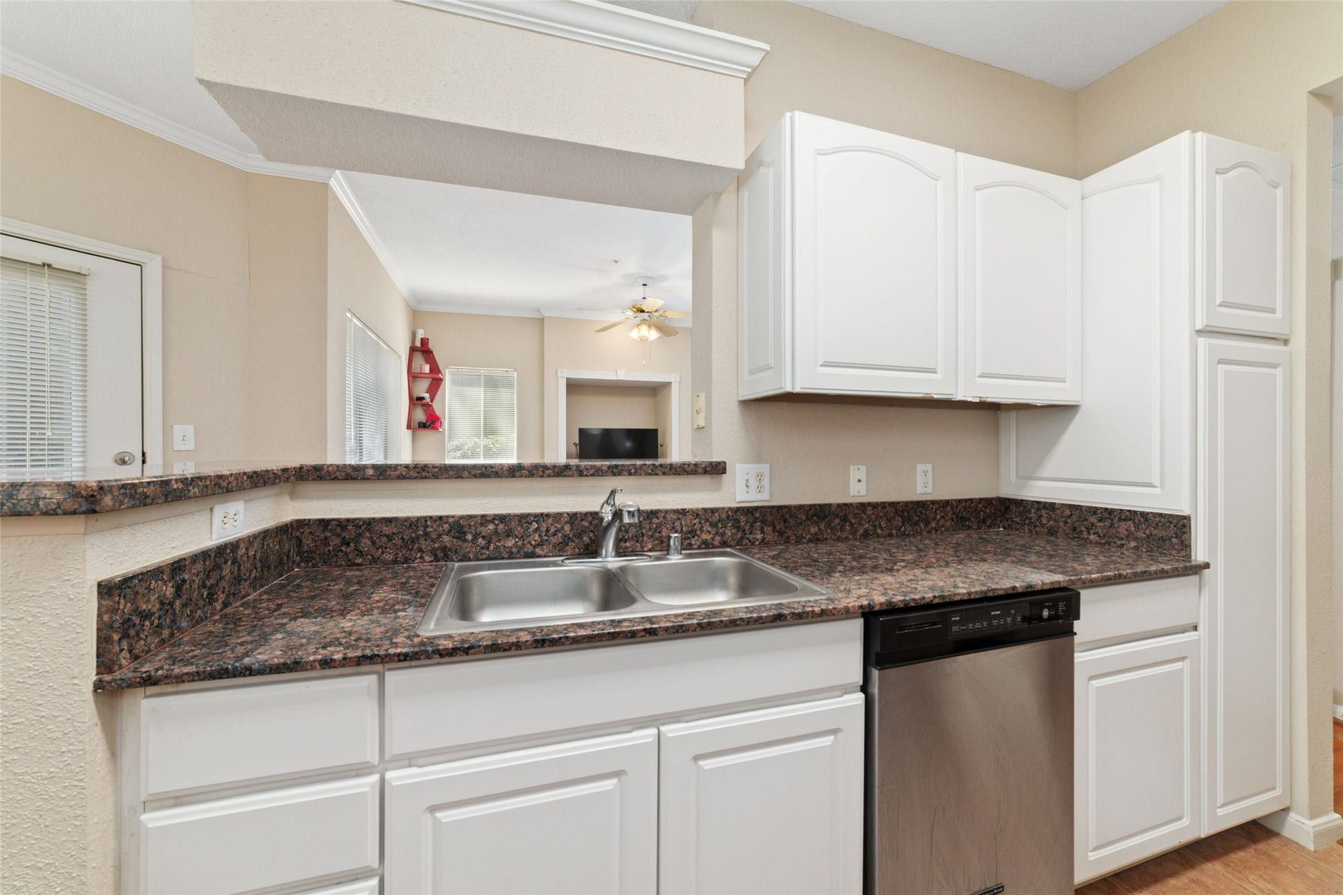 Chefs dream kitchen with an open layout, breakfast bar, and all the upgrades you need. Open to living and dining areas.