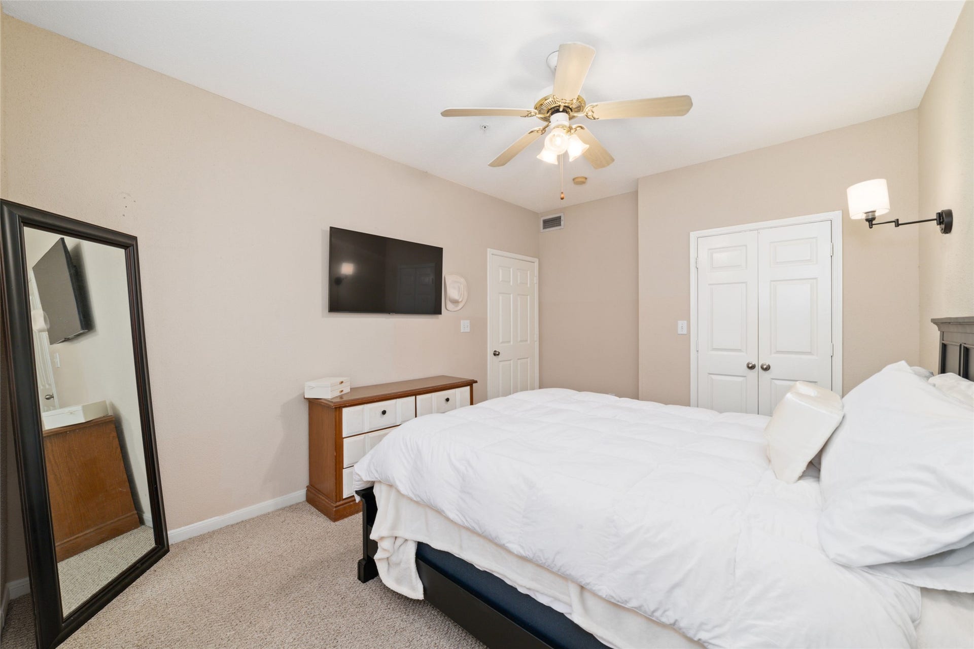 Massive Walk-In Closet  Thoughtfully designed with built-in shelving to maximize storage and organization.