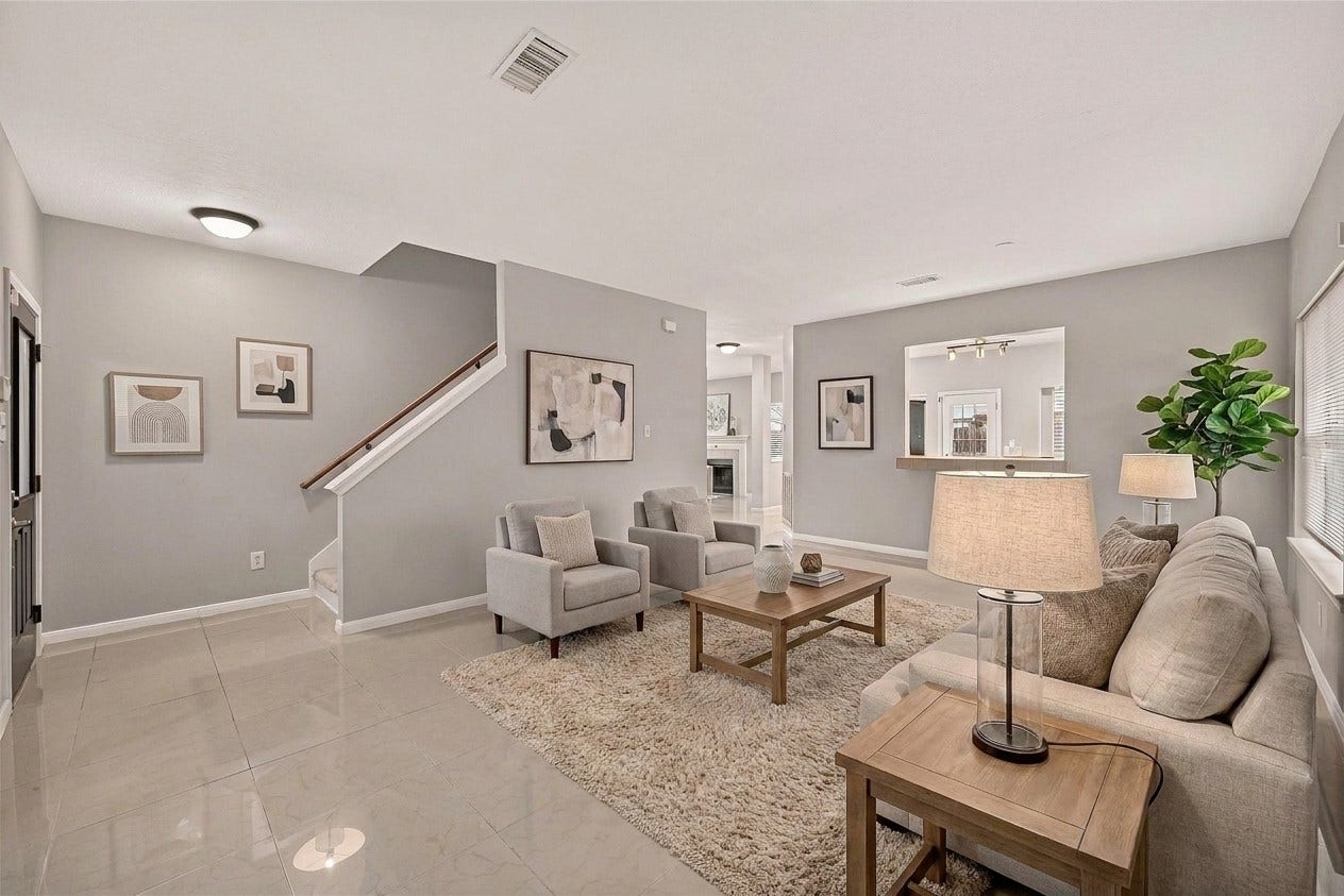 22818 Williamschase Drive, Katy, TX 77449 Virtually staged to showcase the possibilities of this spacious living room