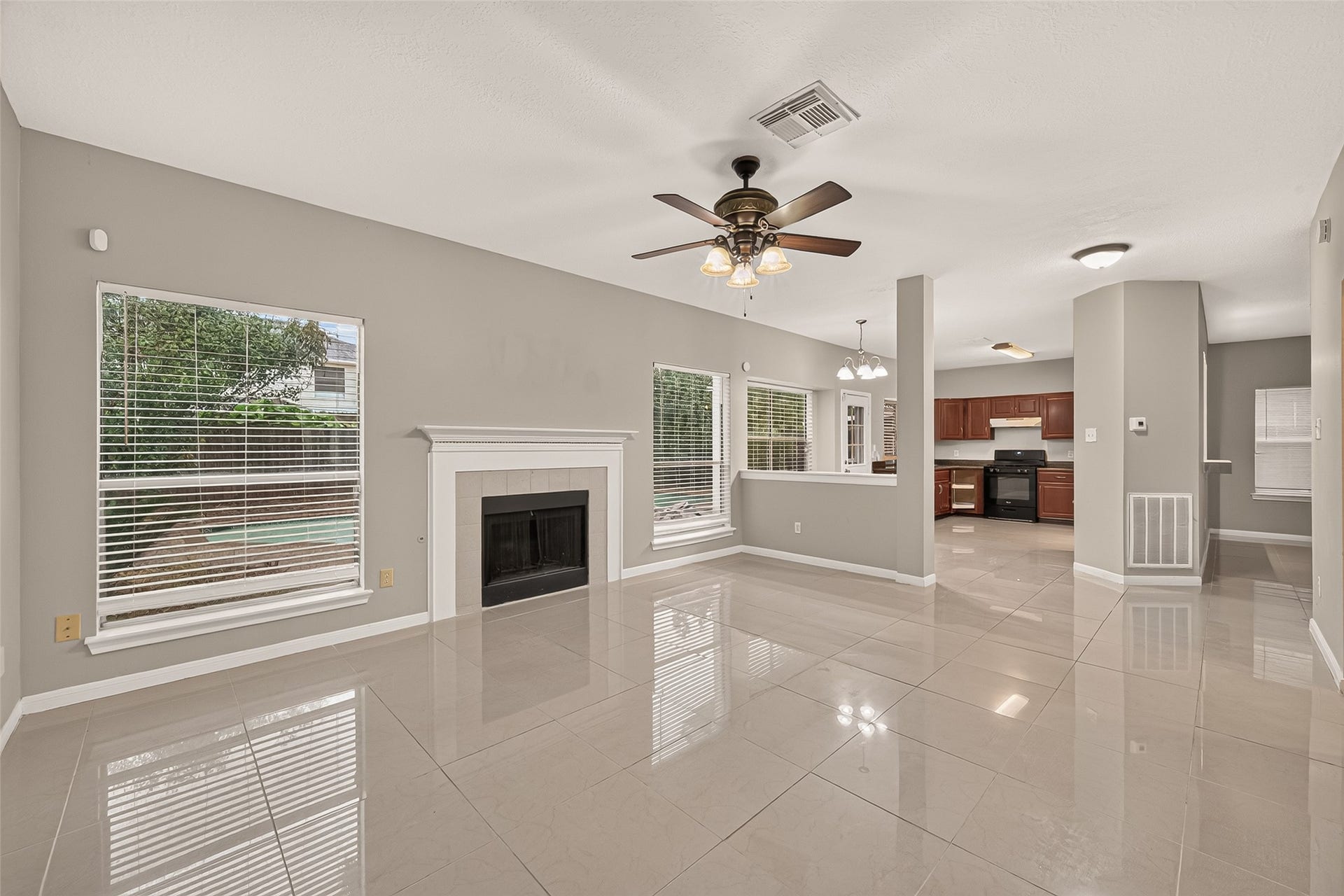 22818 Williamschase Drive, Katy, TX 77449 Den and kitchen area overlooking the pool
