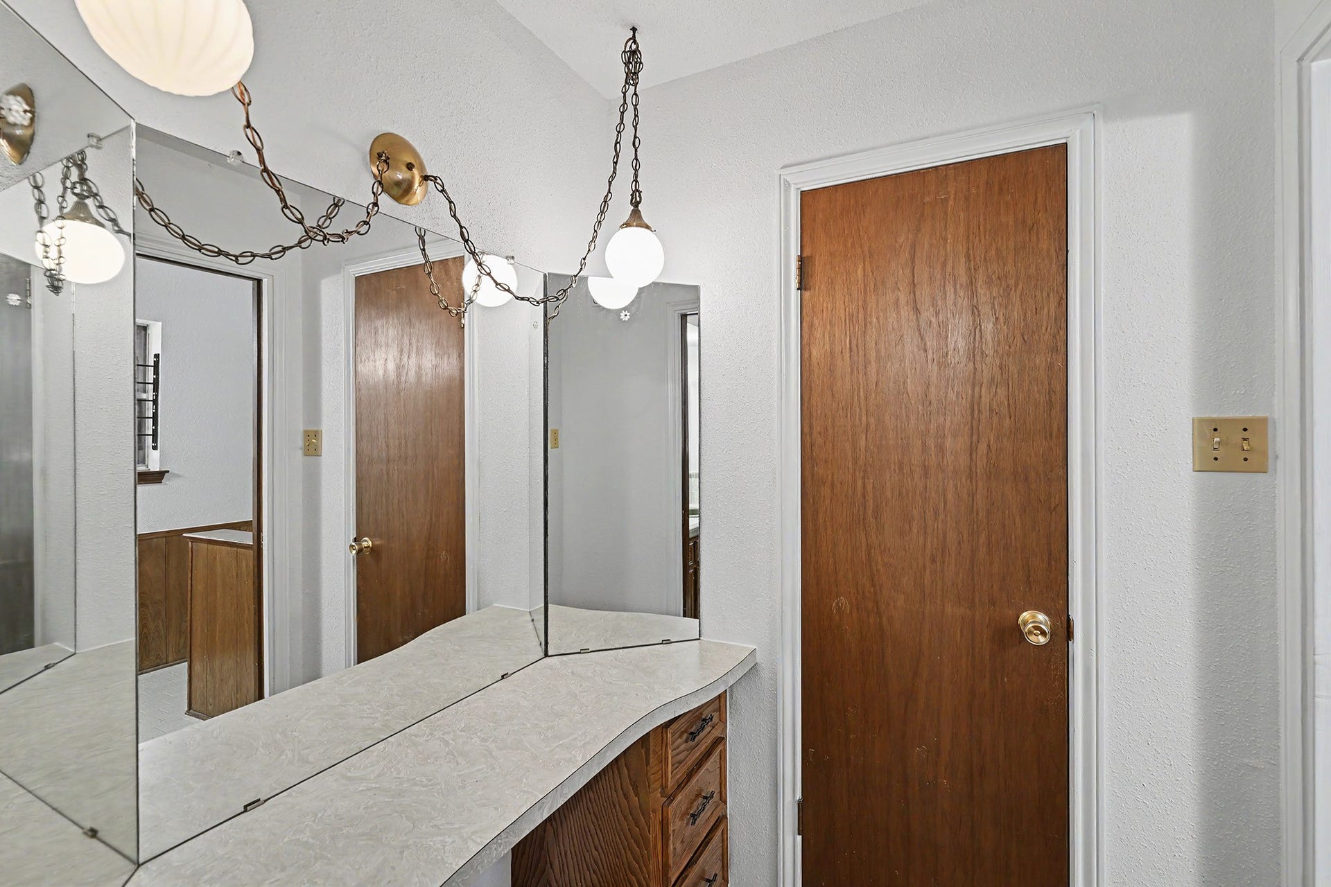 5403 Boots Road, Houston, TX 77091 Vanity area in bedroom 3 with large walk-in closet