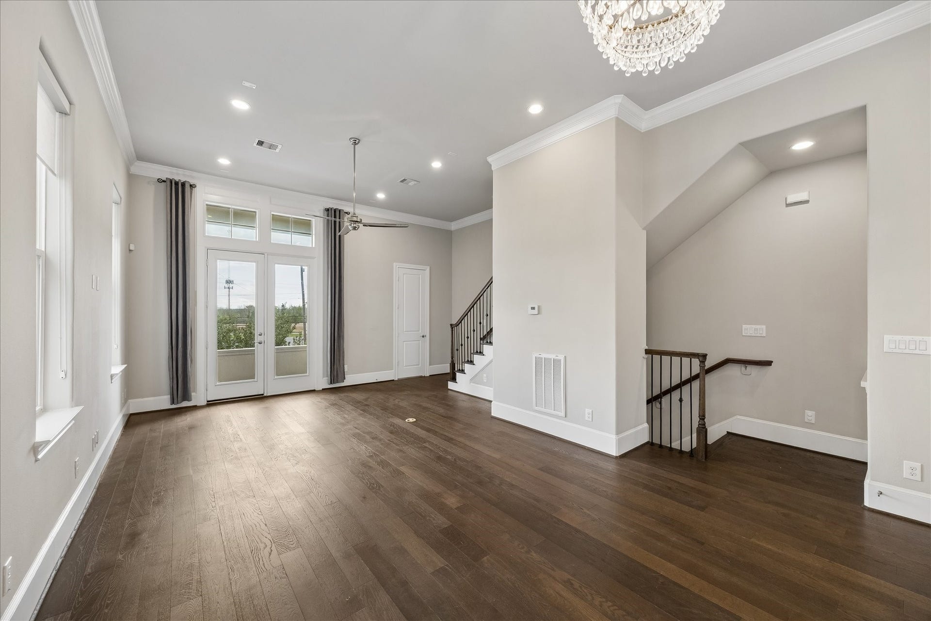9664 Knight Road, Houston, TX 77045 Continue inside and up to the second floor to find an open floorplan with spacious living, high ceilings with tons of natural light and plenty of space to relax or gather. Enjoy balcony access, immediately off of the living room.