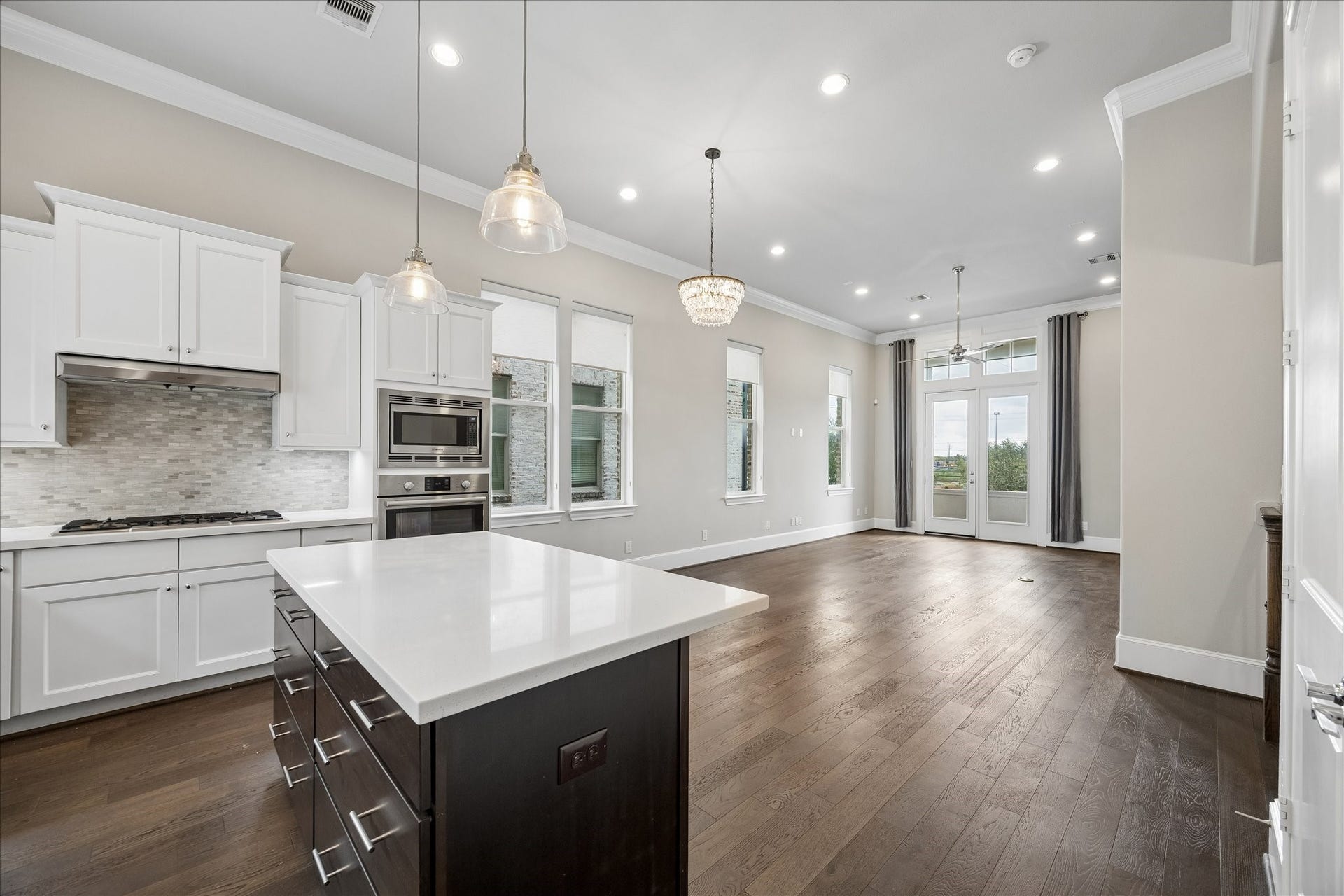 9664 Knight Road, Houston, TX 77045 This view shows how the kitchen opens to the dining and living area, perfect for everyday living.