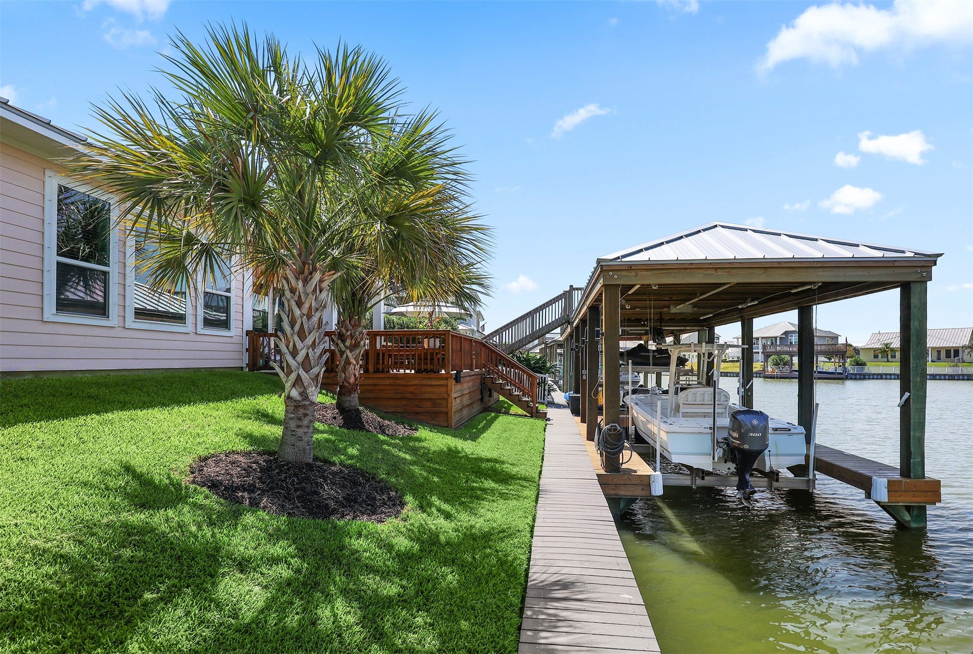 5418 Brigantine Cay Court, Texas City, TX 77590 Mature landscaping at the back of the home.