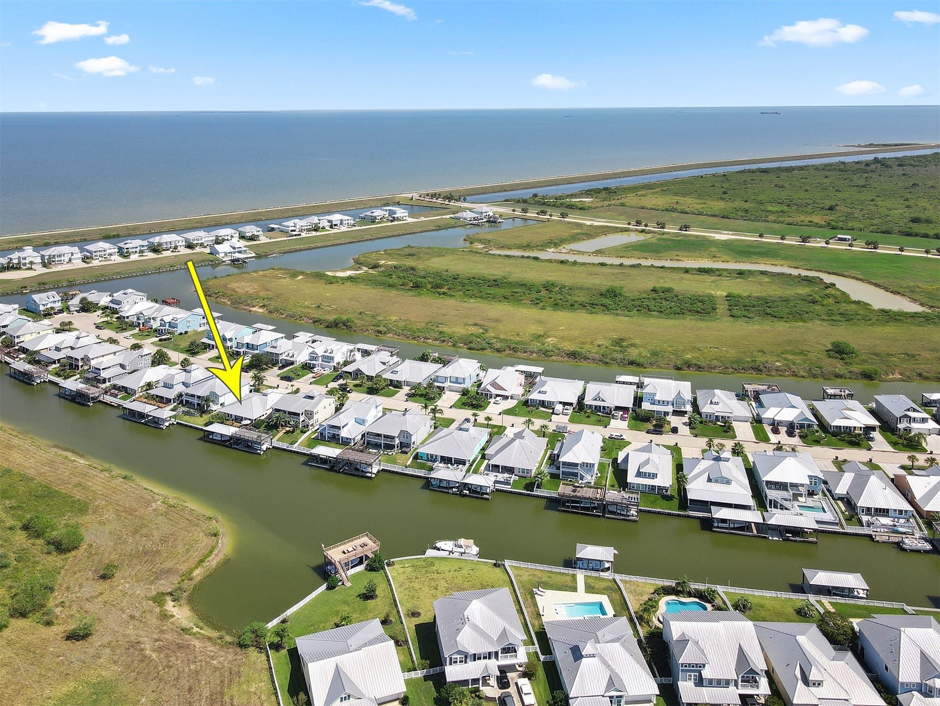 5418 Brigantine Cay Court, Texas City, TX 77590 The neighborhood offers deep water access to Galveston Bay...in the background.