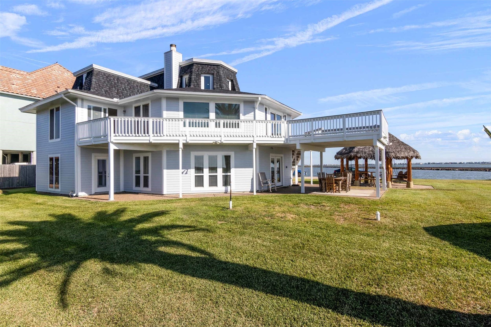 1318 Blue Heron Street, Bayou Vista, TX 77563 This home was designed to accentuate the views with many windows and French doors.