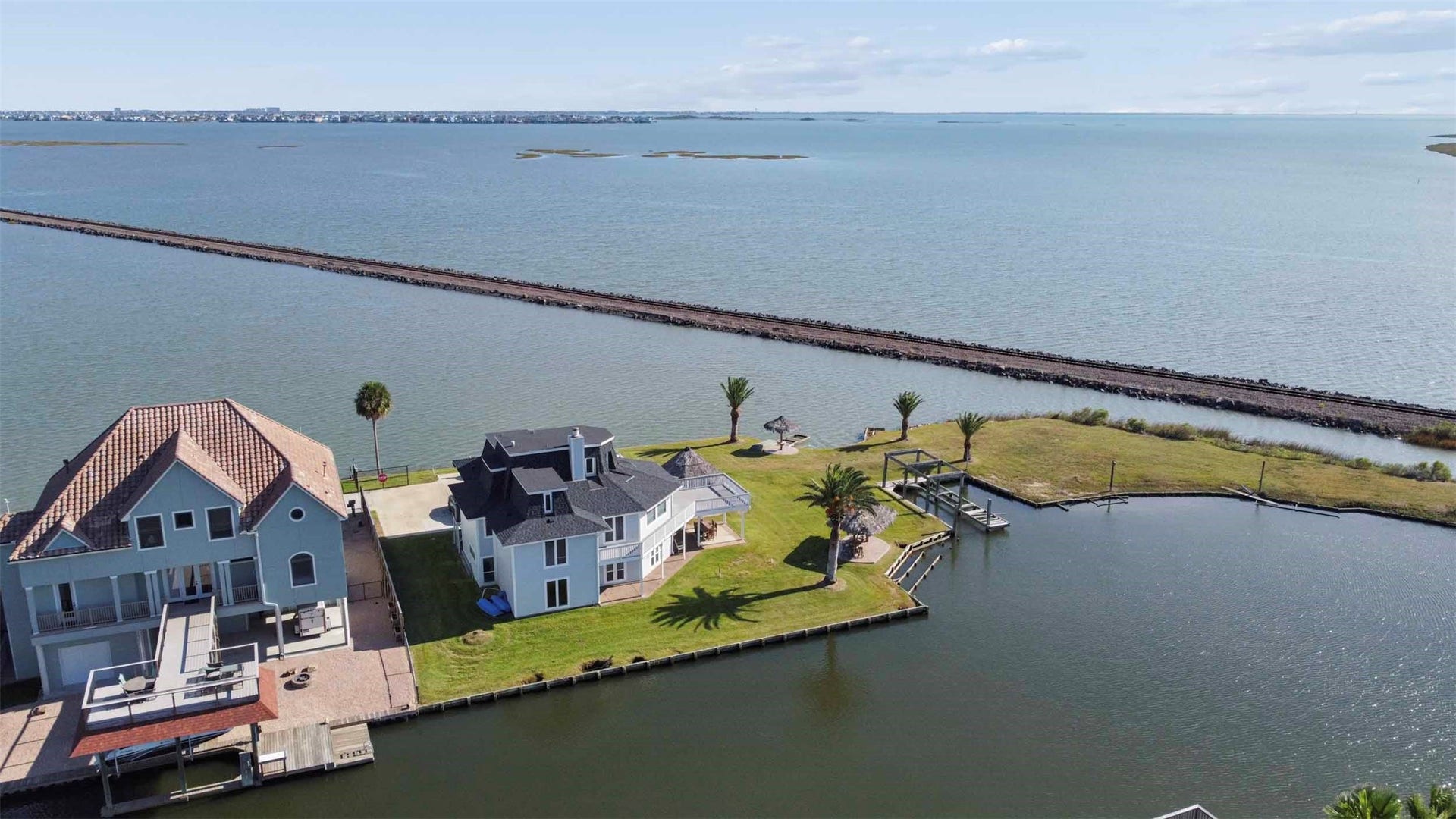 1318 Blue Heron Street, Bayou Vista, TX 77563 Breathtaking views of Tiki Island, Galveston Island and Harborwalk.