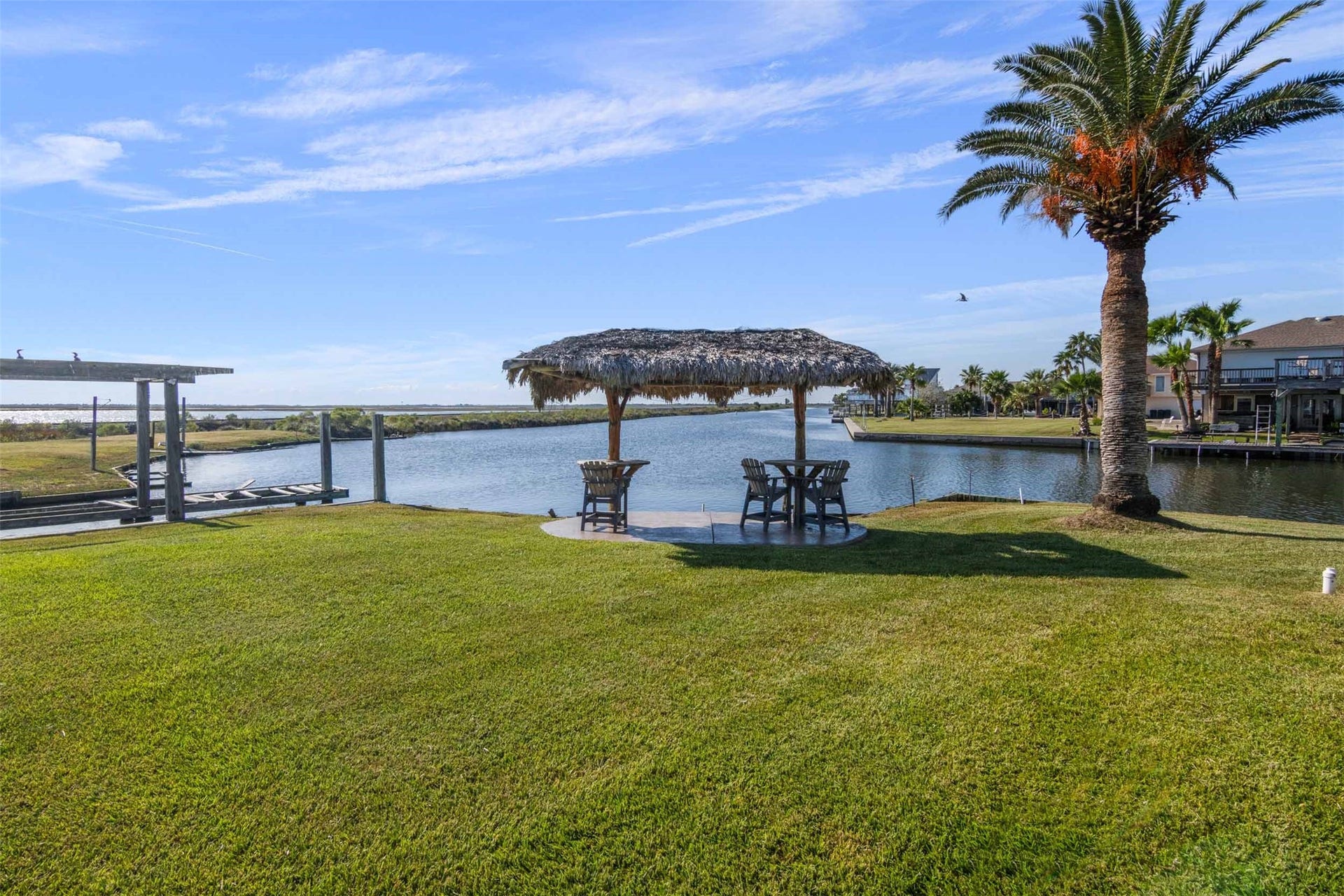 1318 Blue Heron Street, Bayou Vista, TX 77563 Relax under the palapa.