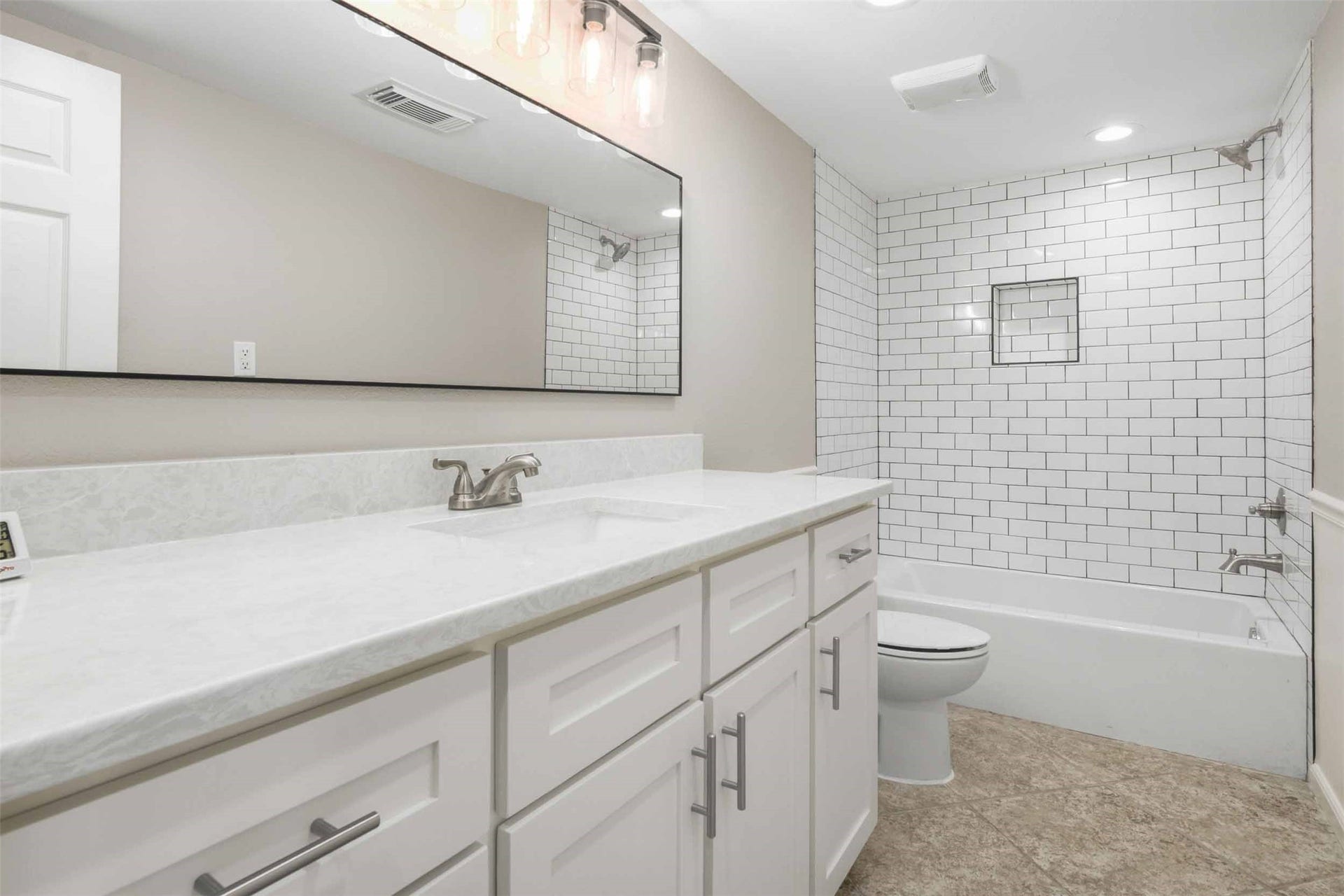 1318 Blue Heron Street, Bayou Vista, TX 77563 Updated bathroom with beautiful quartz countertops.