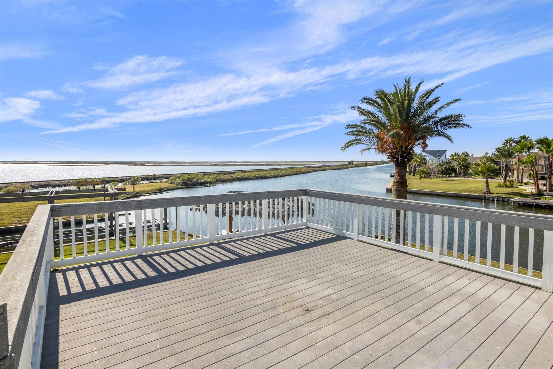 1318 Blue Heron Street, Bayou Vista, TX 77563 Large Deck.This home is ideally located just 13 miles from Stewart Beach, Galveston Historic Strand and its renowned seafood restaurants.