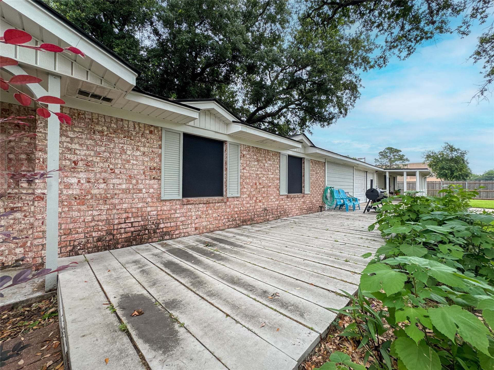 201 W 5th Street, Deer Park, TX 77536 Front walkway leading to shaded porch