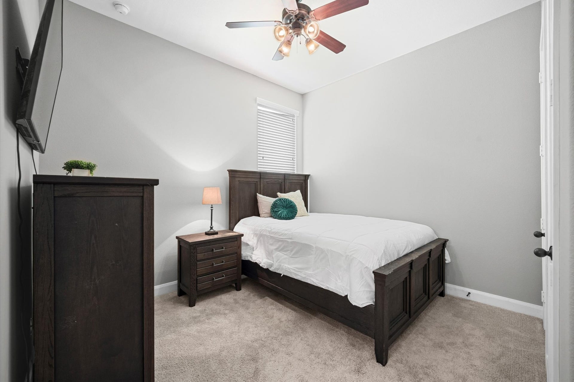 24611 Waterstone Estates Circle S, Tomball, TX 77375 Bedroom 2 stands alone and offers a private bath, making this an ideal guest suite.