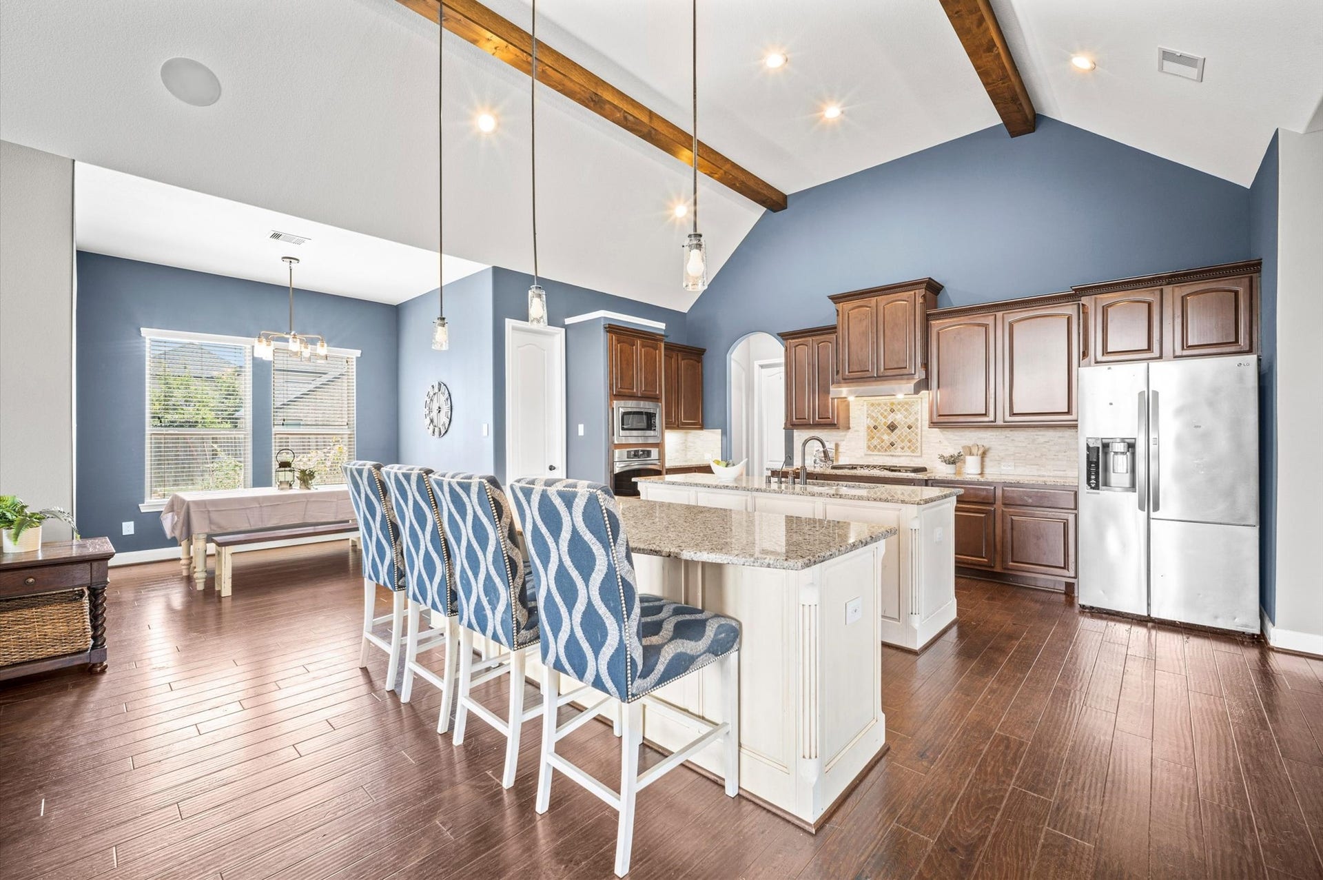 24611 Waterstone Estates Circle S, Tomball, TX 77375 The engineered wood floors run seamlessly throughout the home, joining the gathering spaces together. It's an ideal home for entertaining. Here is your first peek at a chef-worthy kitchen.