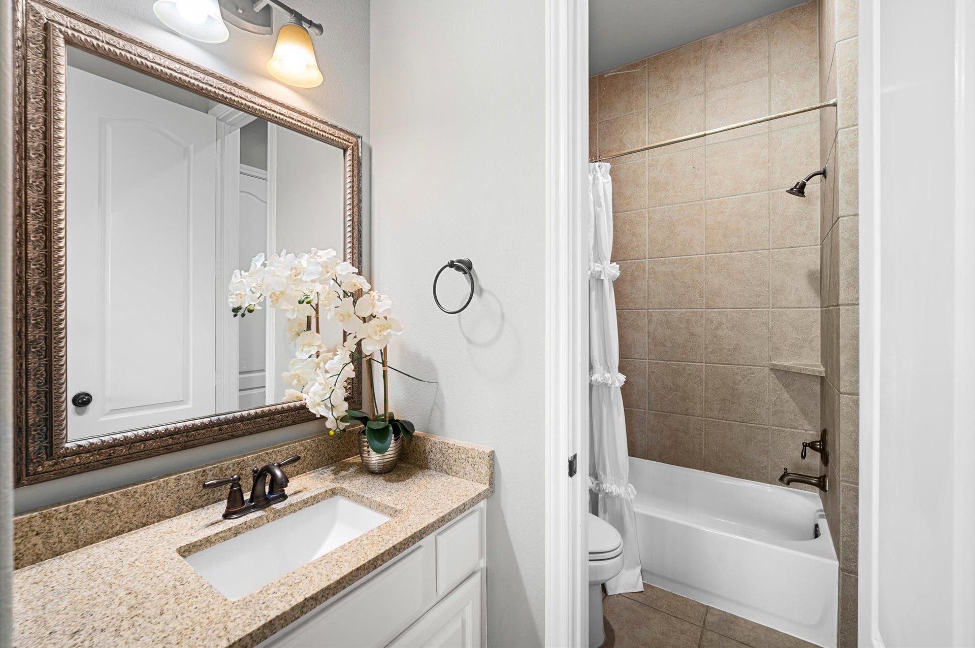 24611 Waterstone Estates Circle S, Tomball, TX 77375 The second half of the Jack-n-Jill bath leads to Bedroom 3.