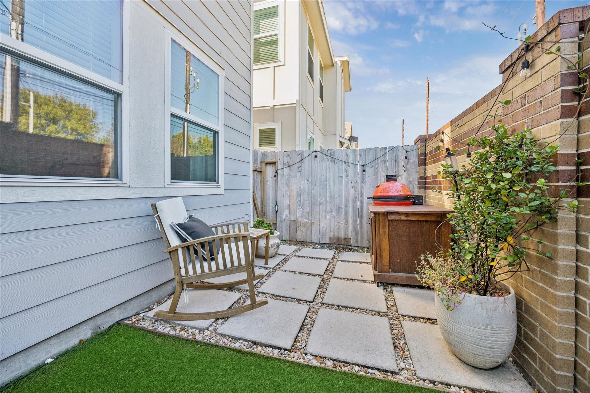 Relax, entertain, and unwind in your charming backyard.