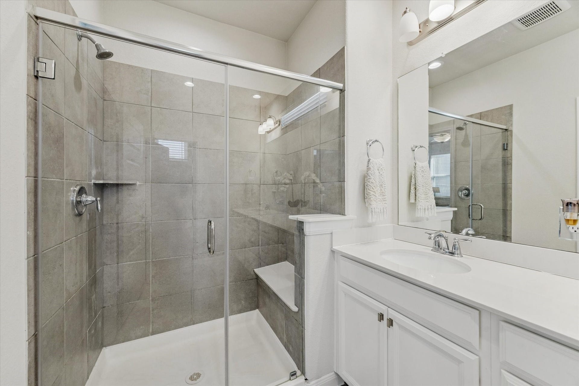 A spa-inspired primary bath with thoughtful details throughout.
