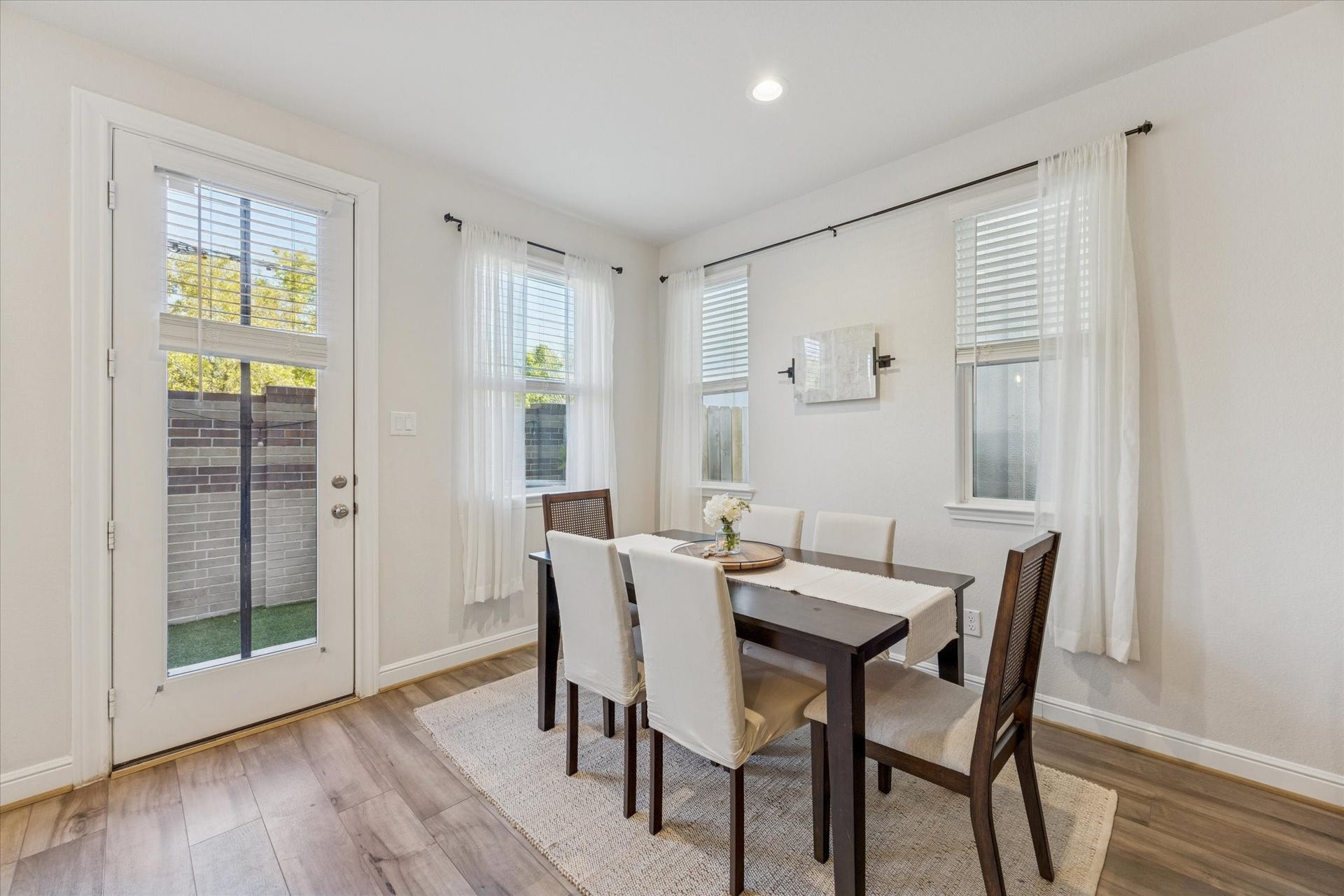 Bright, inviting dining area with room for everyone at the table.