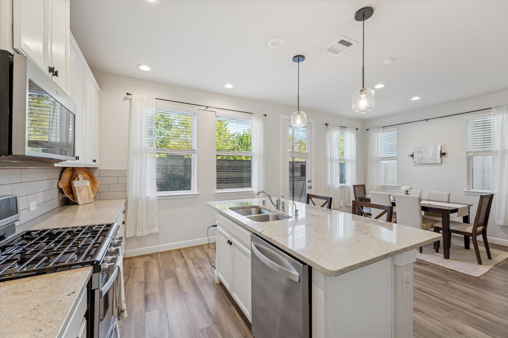 Whip up meals or enjoy coffee at the spacious island centerpiece.