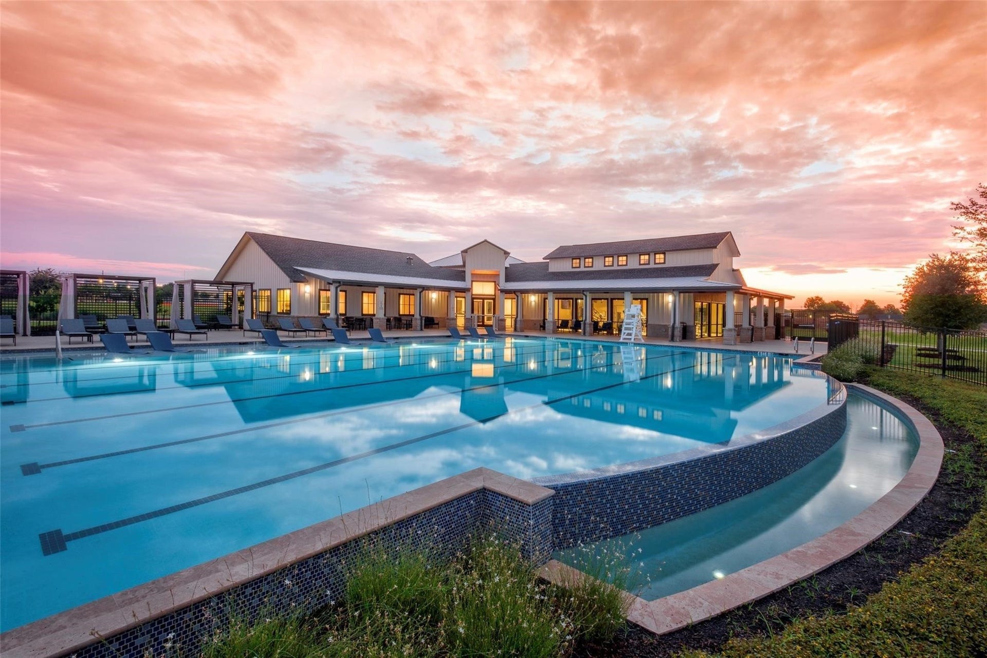 Beautiful view of the pool at dusk.